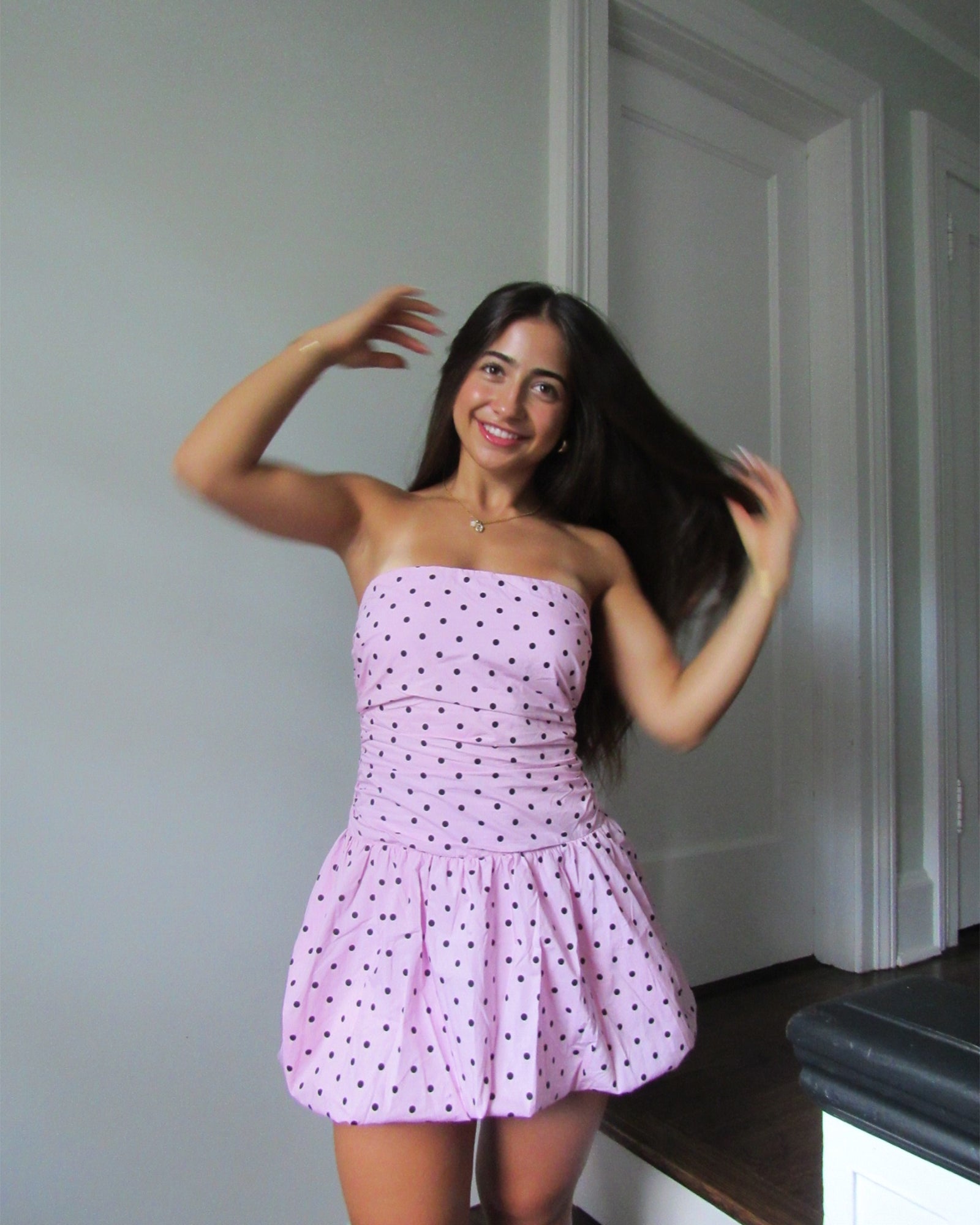 Close-up of polka dot cotton fabric used in pink maxi dress version with similar cut.