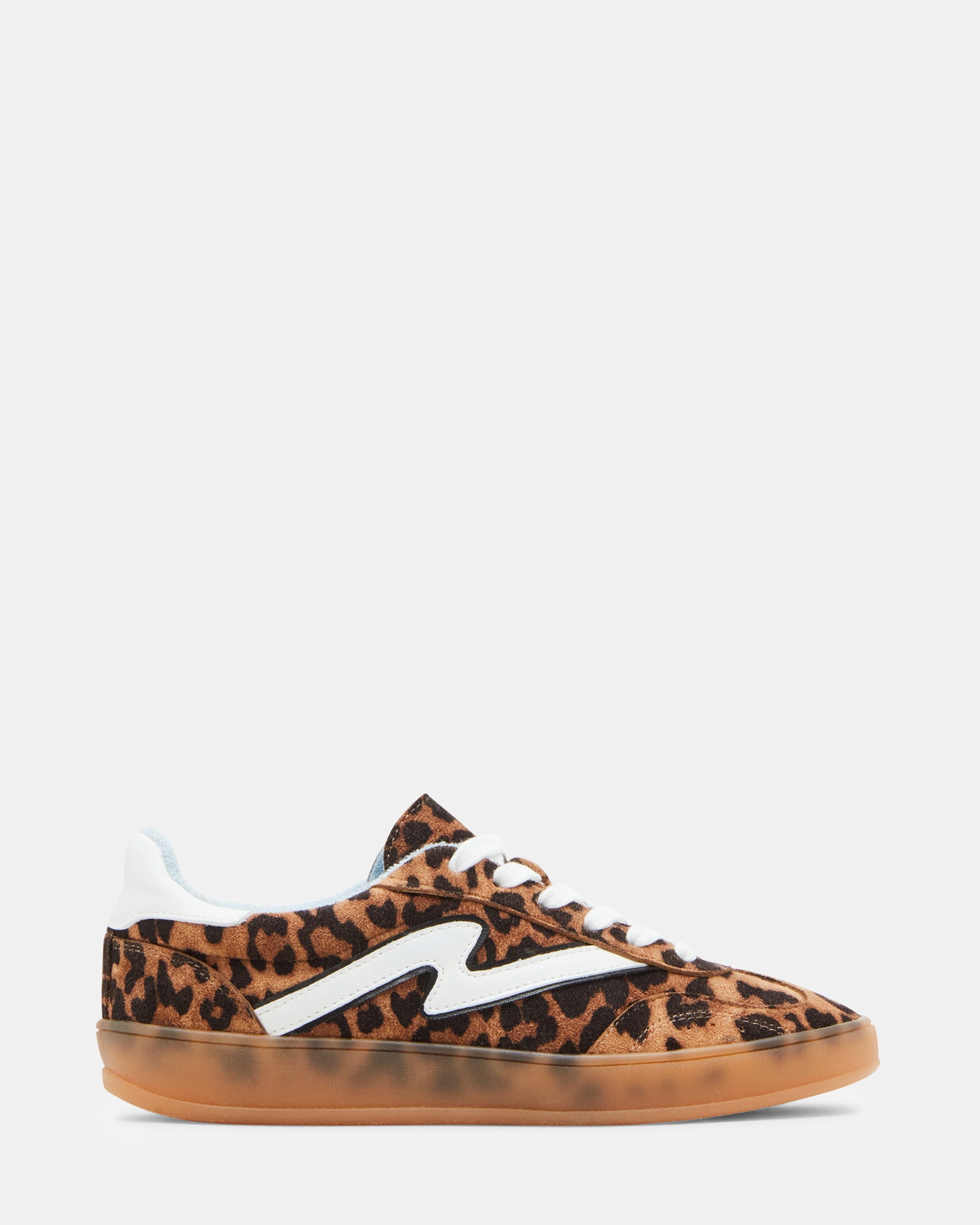 Front view of GIIA leopard print sneakers on a wooden floor