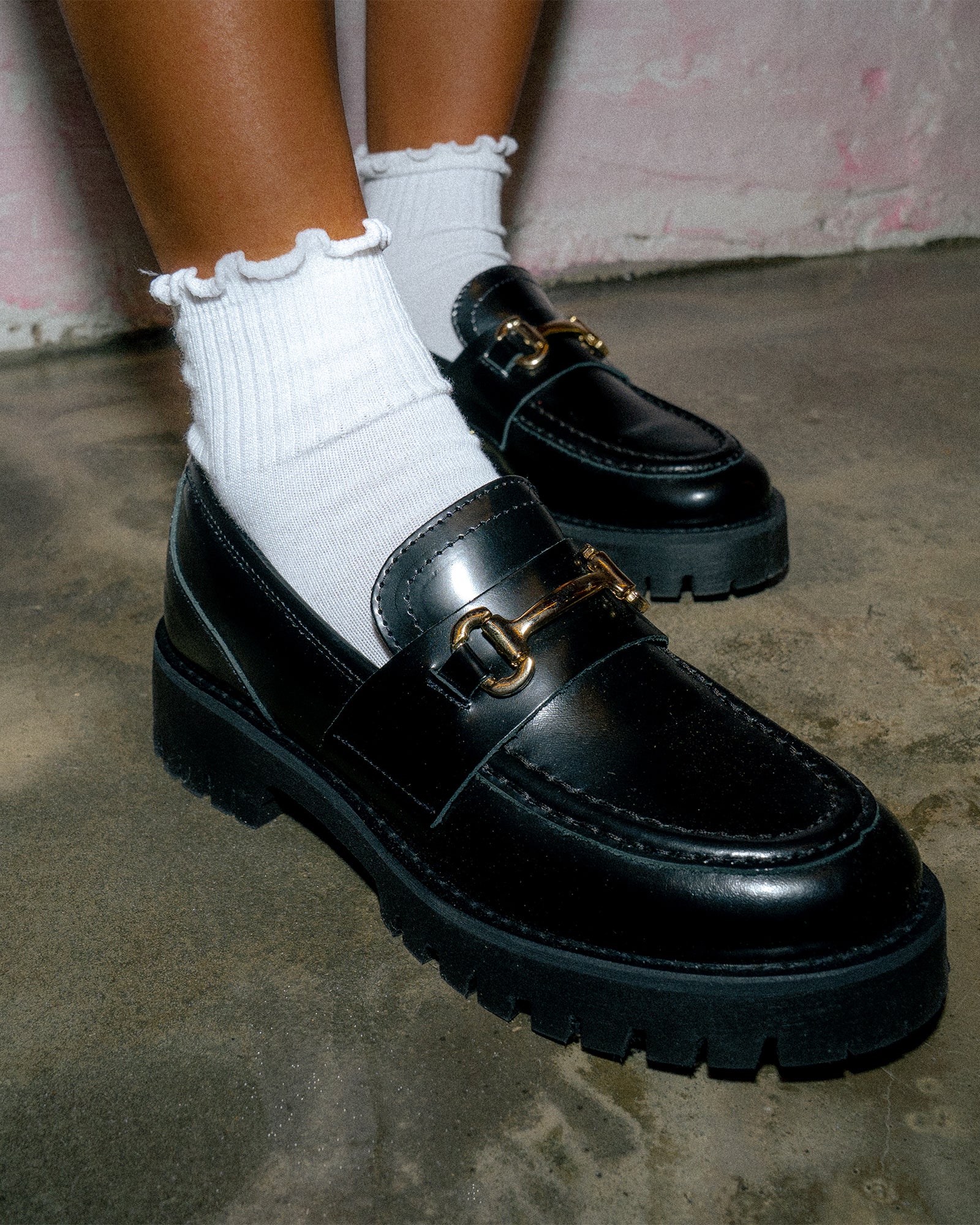 Side view of the trendy platform loafer with horsebit hardware and chunky sole