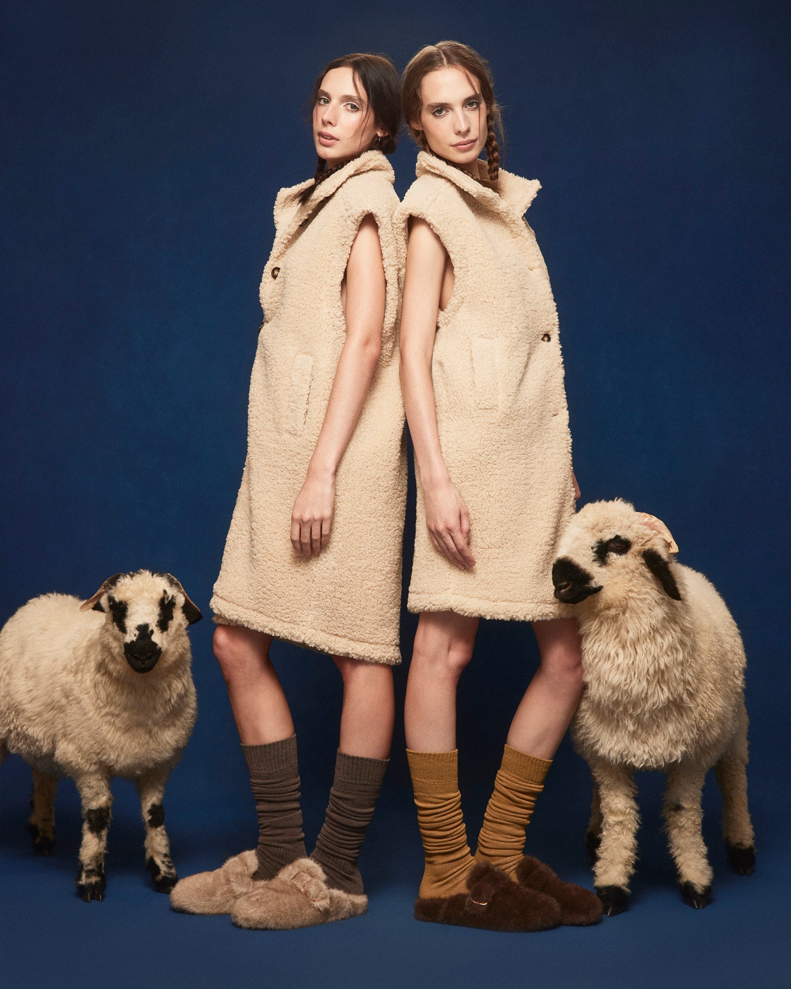 Front view of BOHAN NATURAL faux fur slip-on shoes with buckle detail