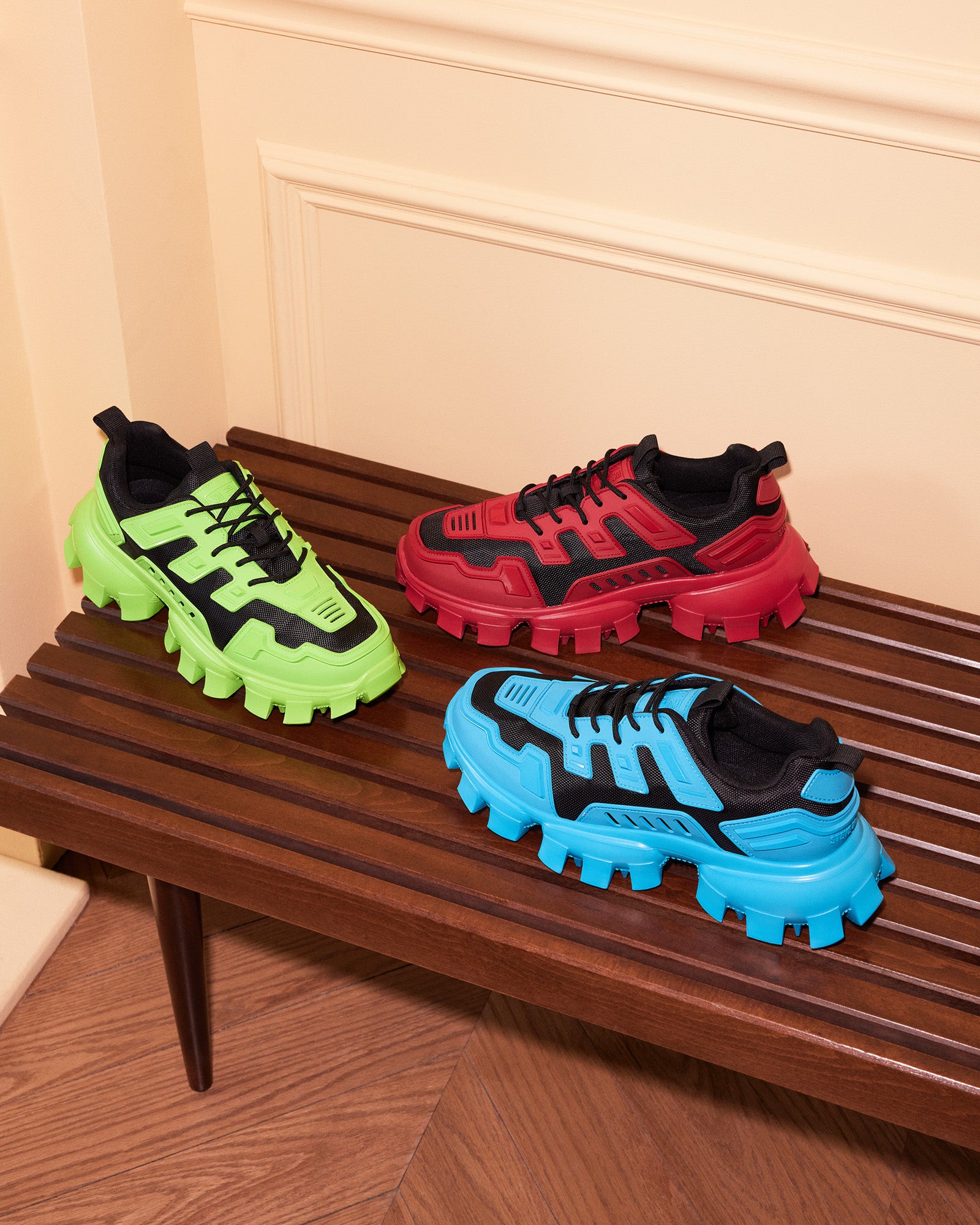 Side view of Ponce Blue Multi chunky sneakers with textured accents.