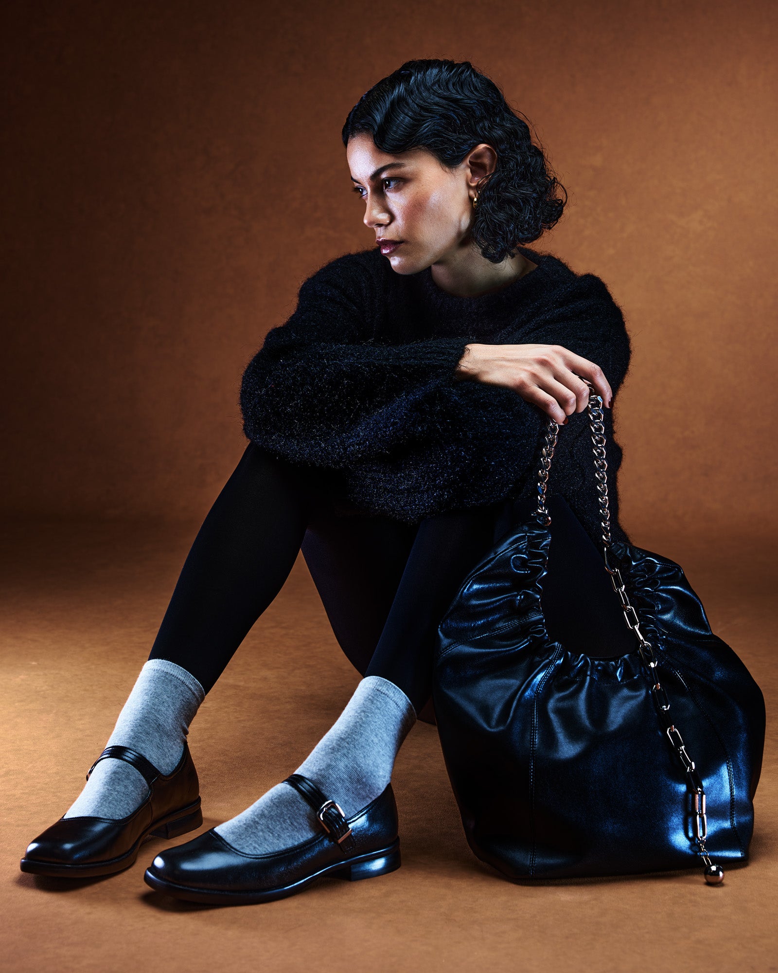 Delancy leather flats worn casually with jeans for a chic look.