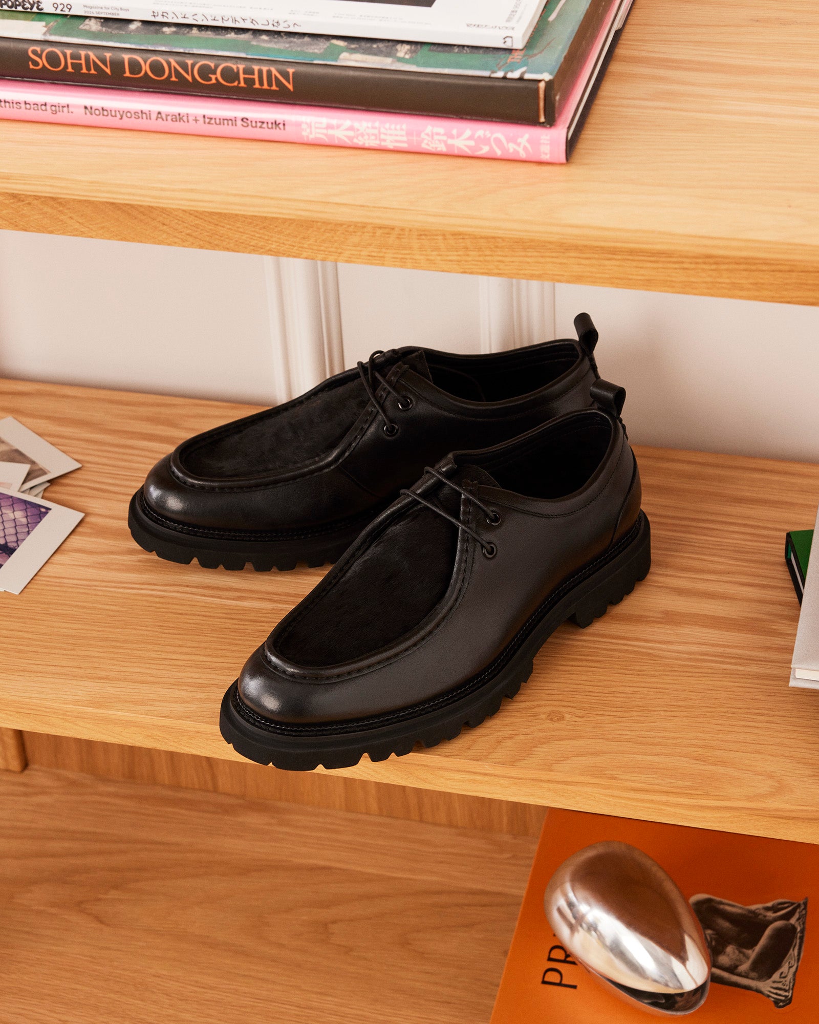 Mens oxford shoes on display against a hardwood floor – perfect for upscale events