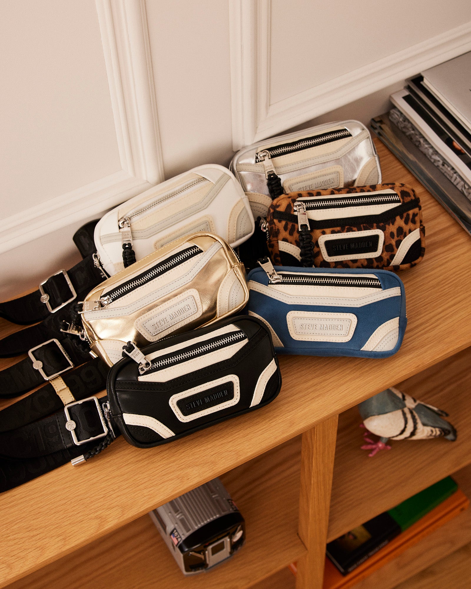 Close-up of the Madridd belt bags zipper and bungee feature.