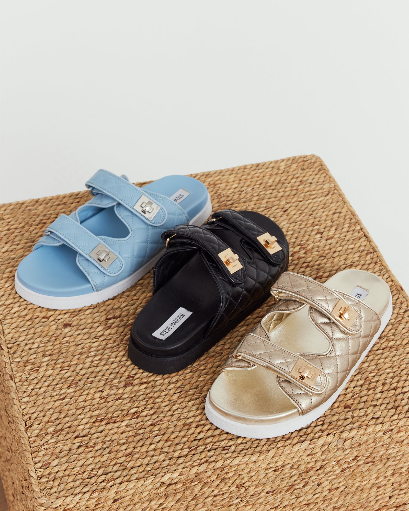 Side-angle of mens leather sandals paired with weekend attire