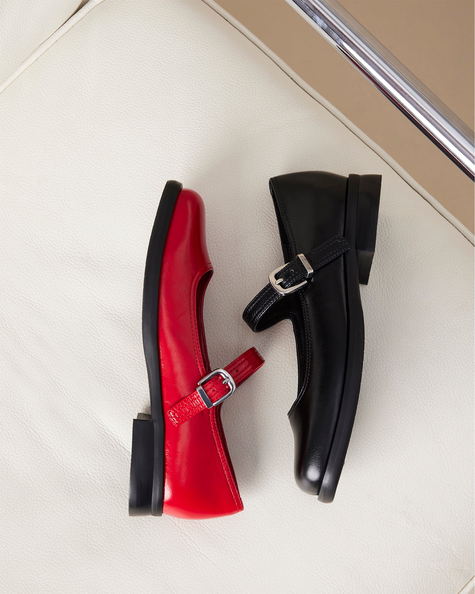 Delancy black Mary Jane shoes displayed with a dress for formal occasions.