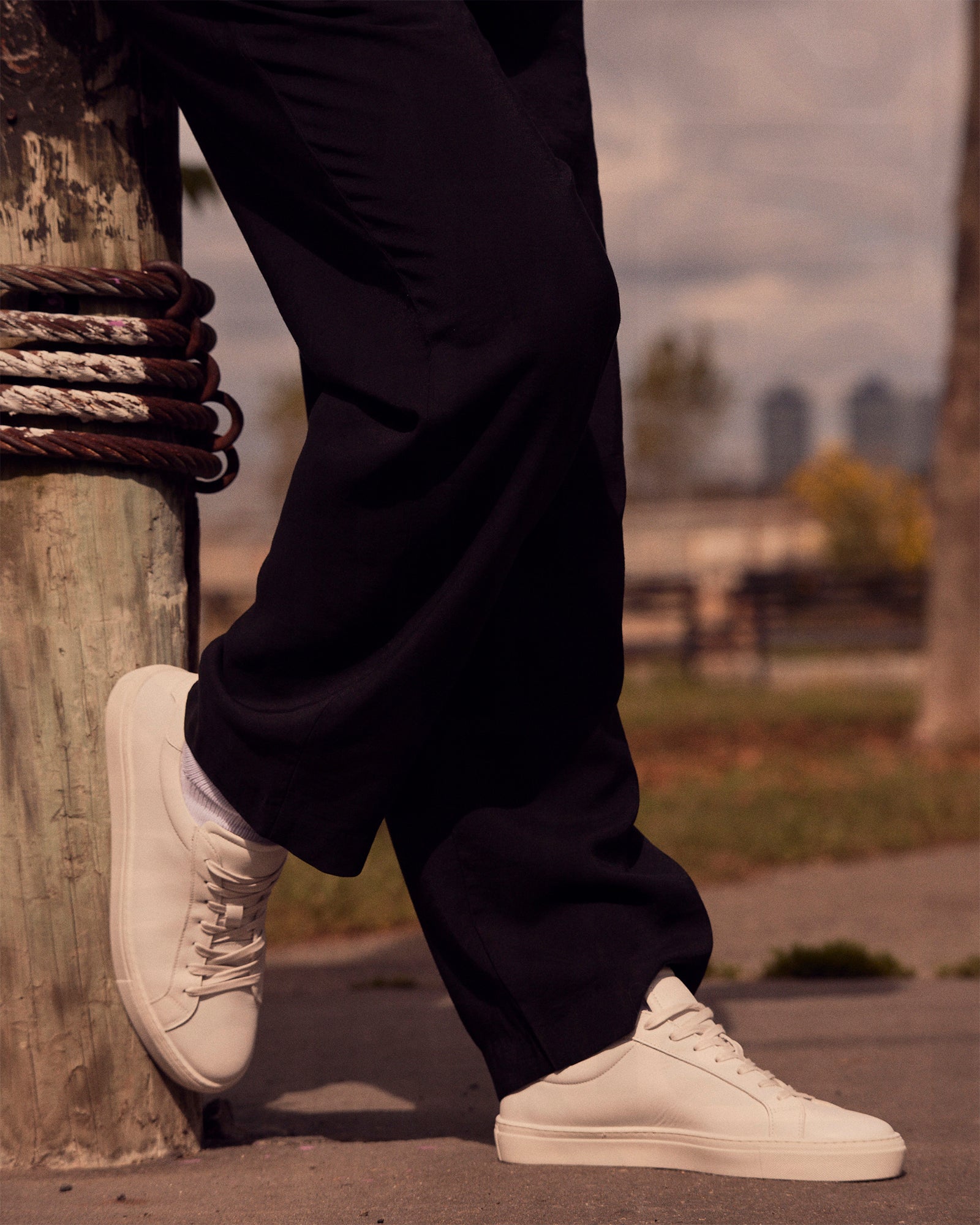 Close-up view of Bottega white leather shoes showcasing the premium leather texture.