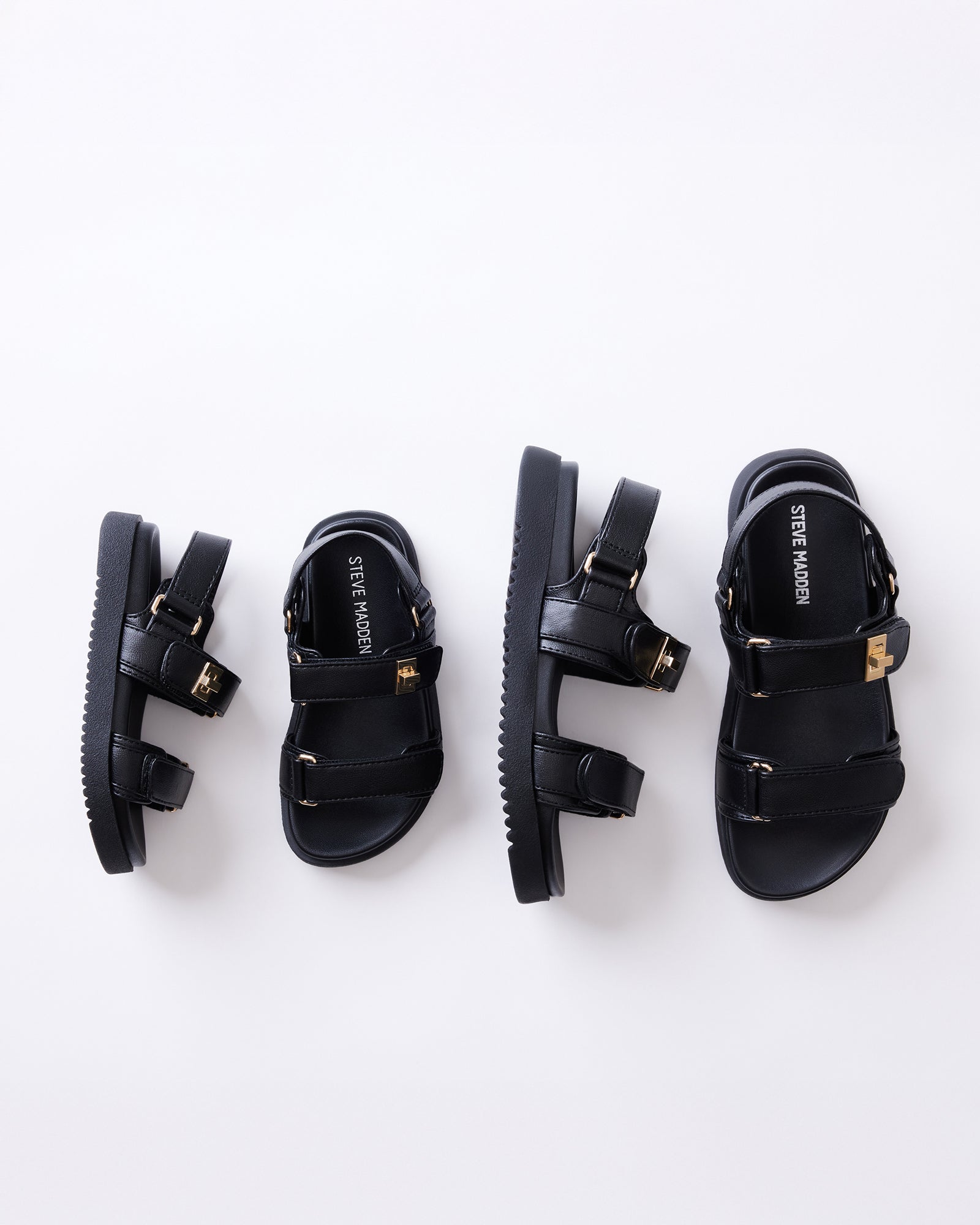 Mona black sandals for kids showcasing adjustable straps and stylish design.