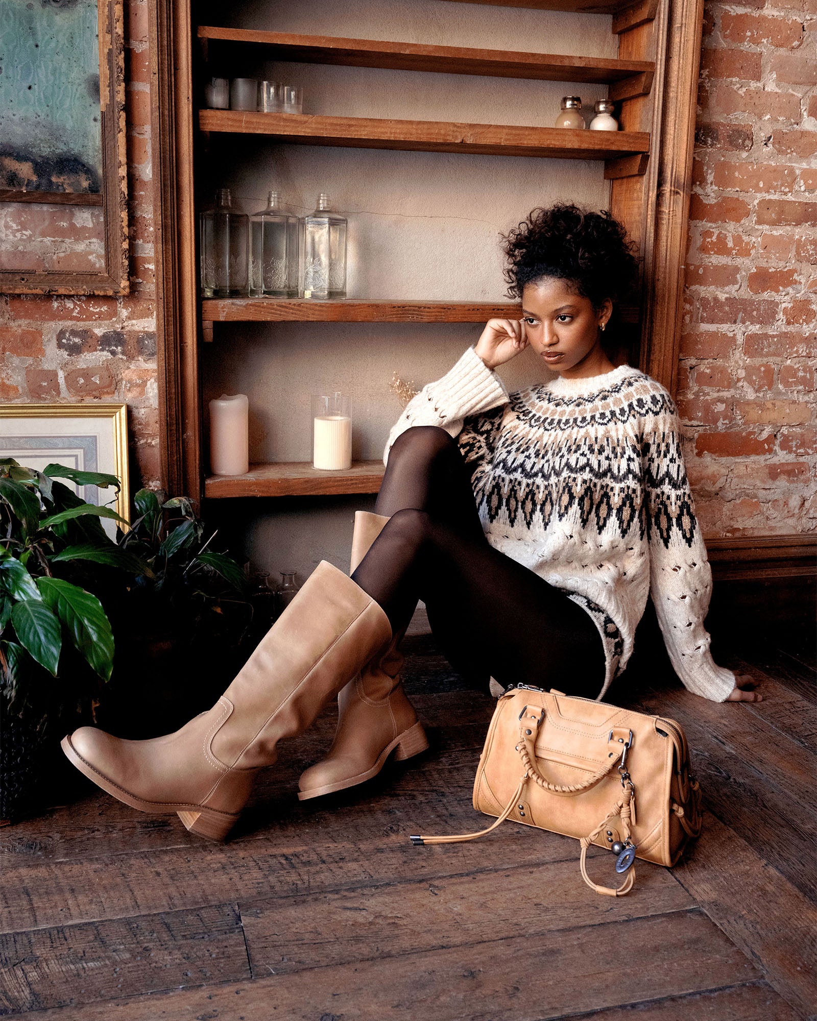 Model wearing the matching sweater set, perfect for a chilly day out.