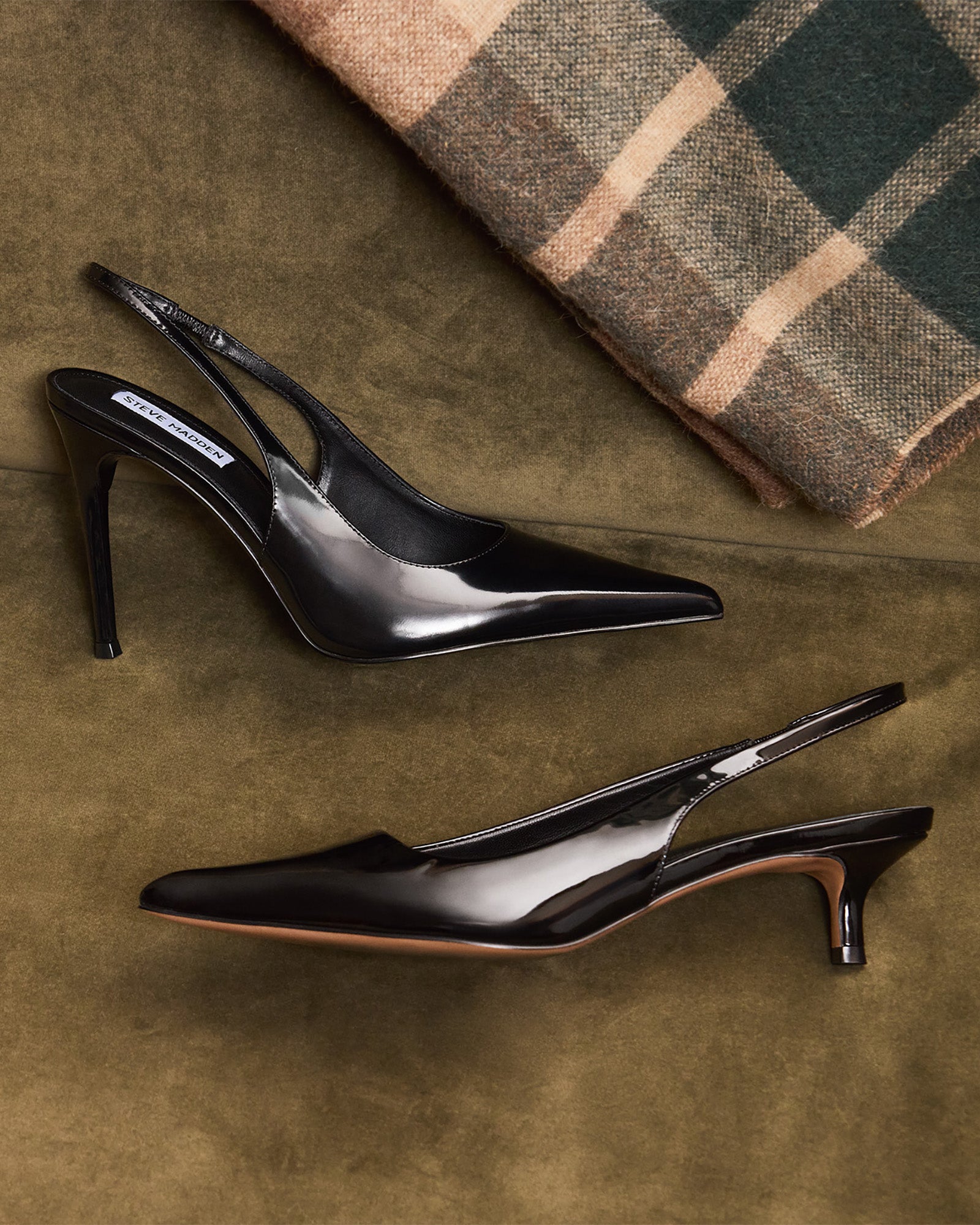 Side angle of black stiletto heels with pointed toe for formal wear