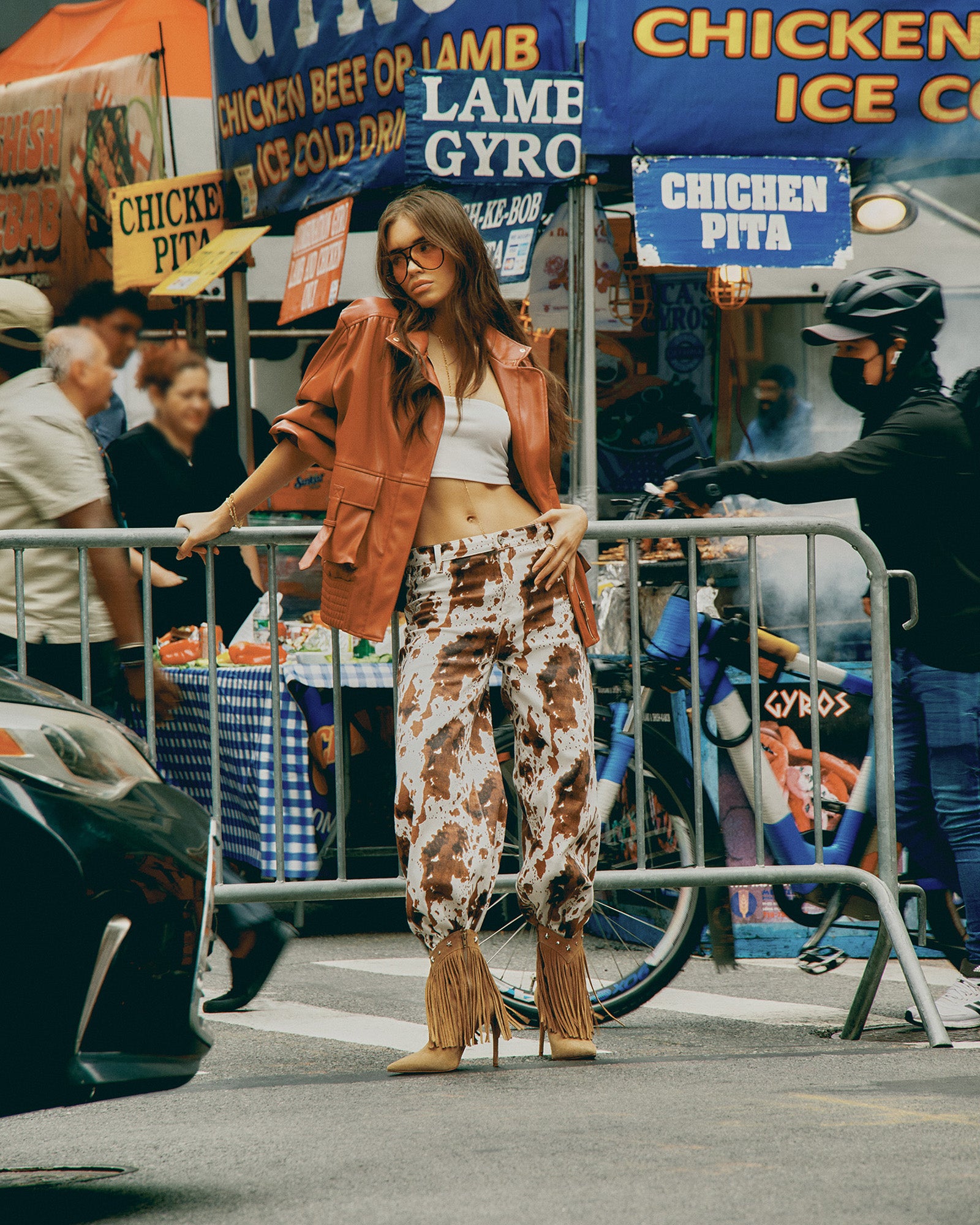 Front view of the Dusty Brick Faux Bomber Leather Jacket on a model.