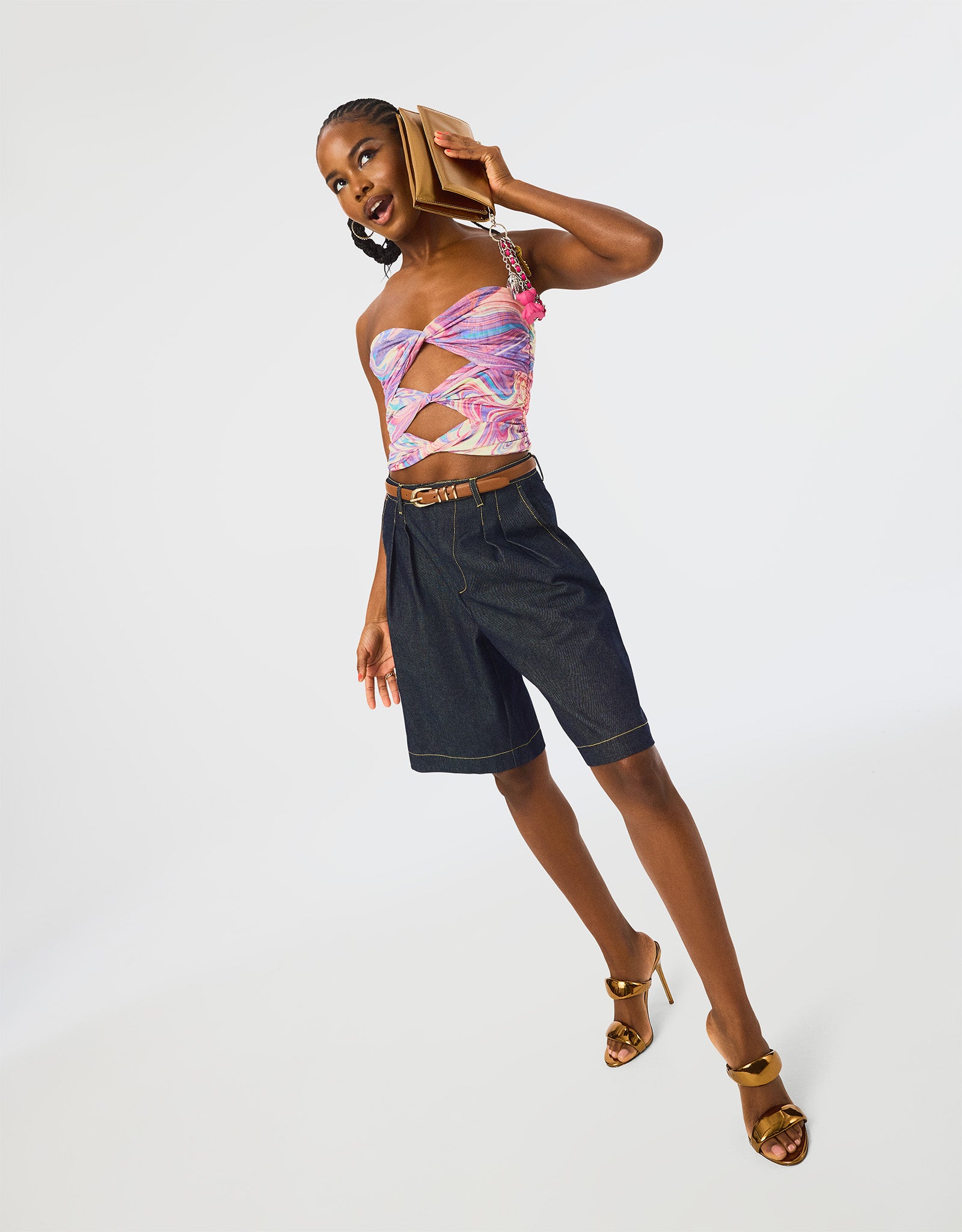 Close-up of Ivana denim shorts showcasing the front pockets and zipper detail.