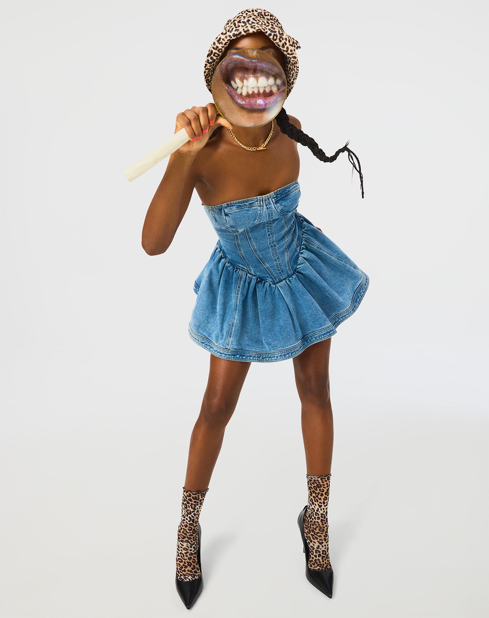 Front view of the chic strapless peplum denim top, perfect for casual wear.