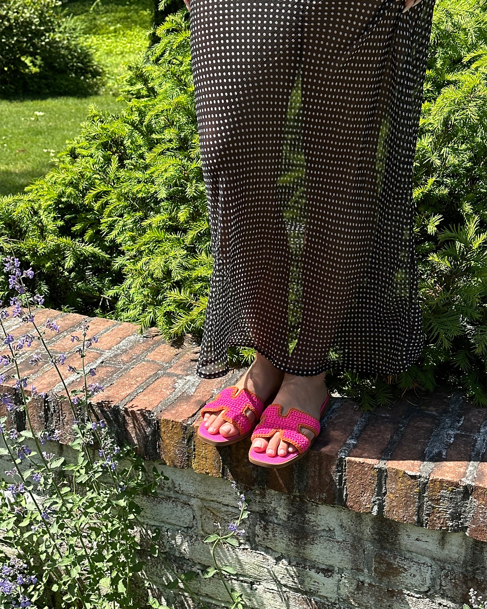 Close-up of Hadyn Pink Multi flat sandals showing geometric cutout details