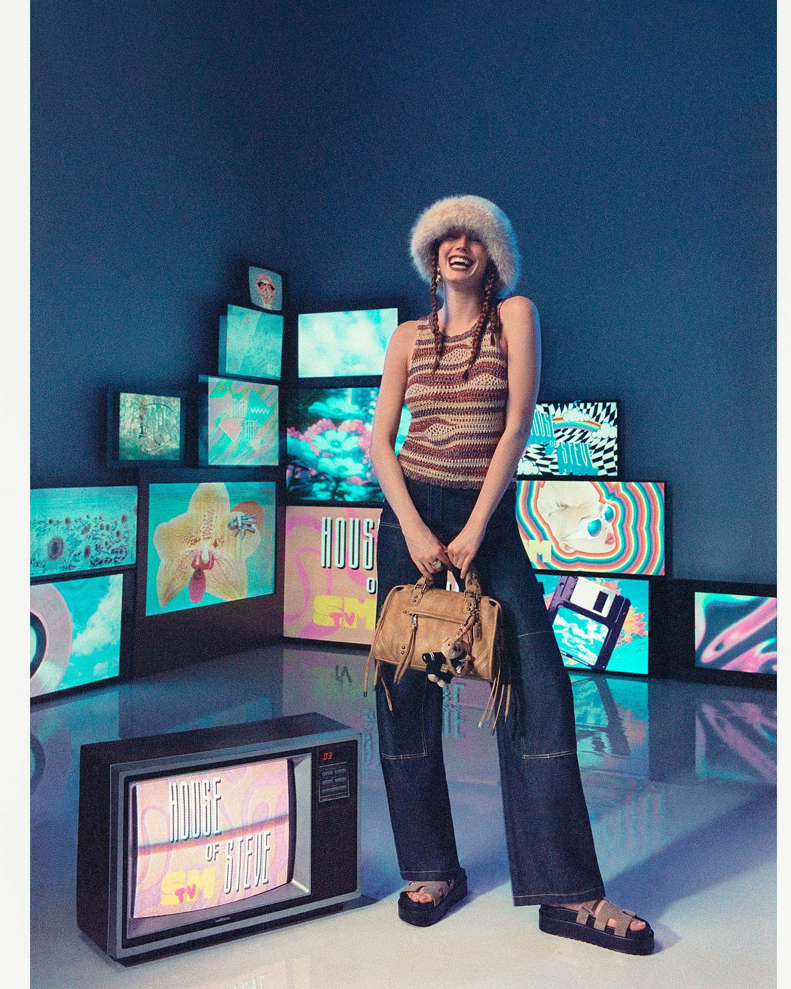 Styled with a casual outfit, showcasing the versatile top handle and crossbody strap