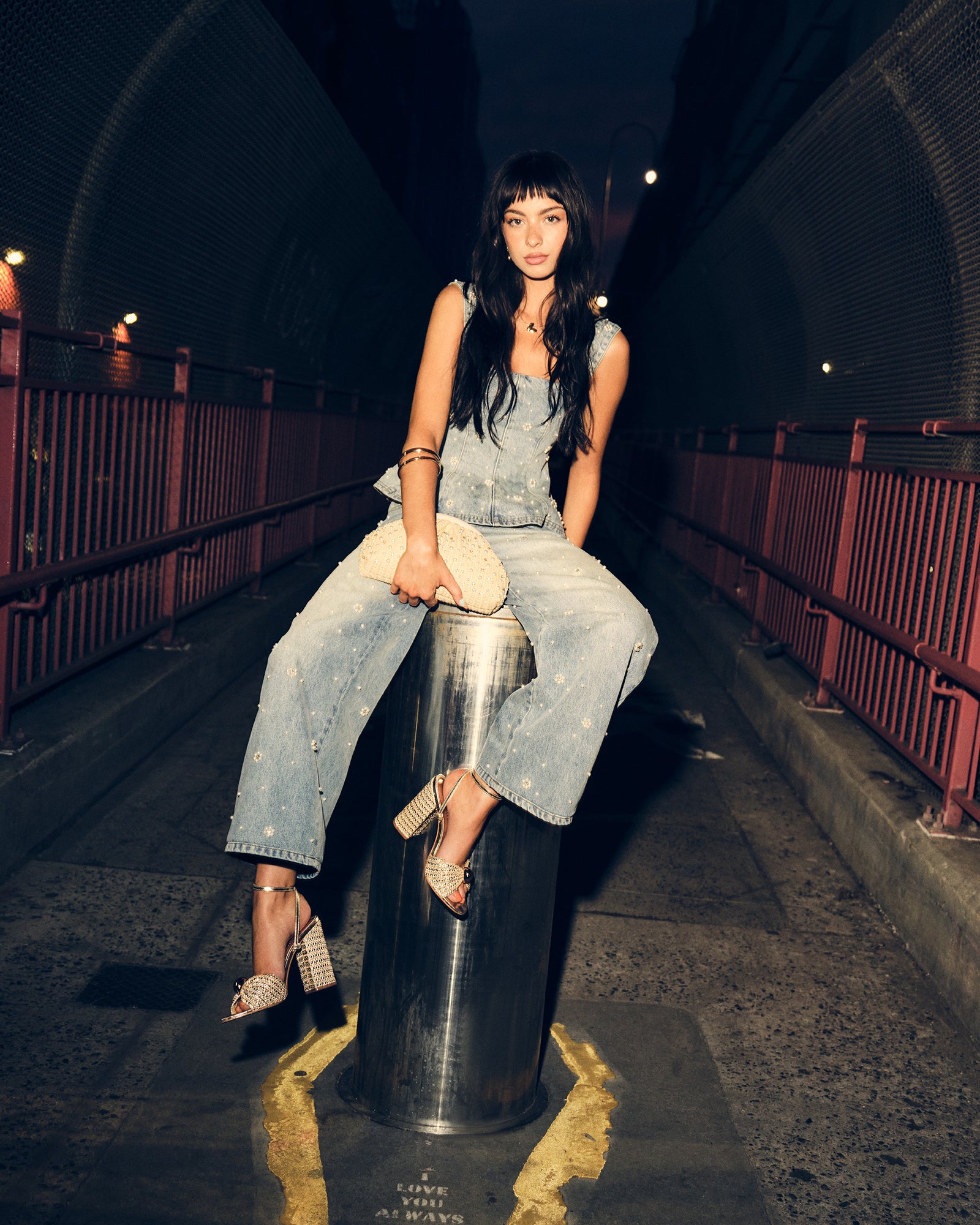 Side angle of the denim tank top women’s fit styled with matching set