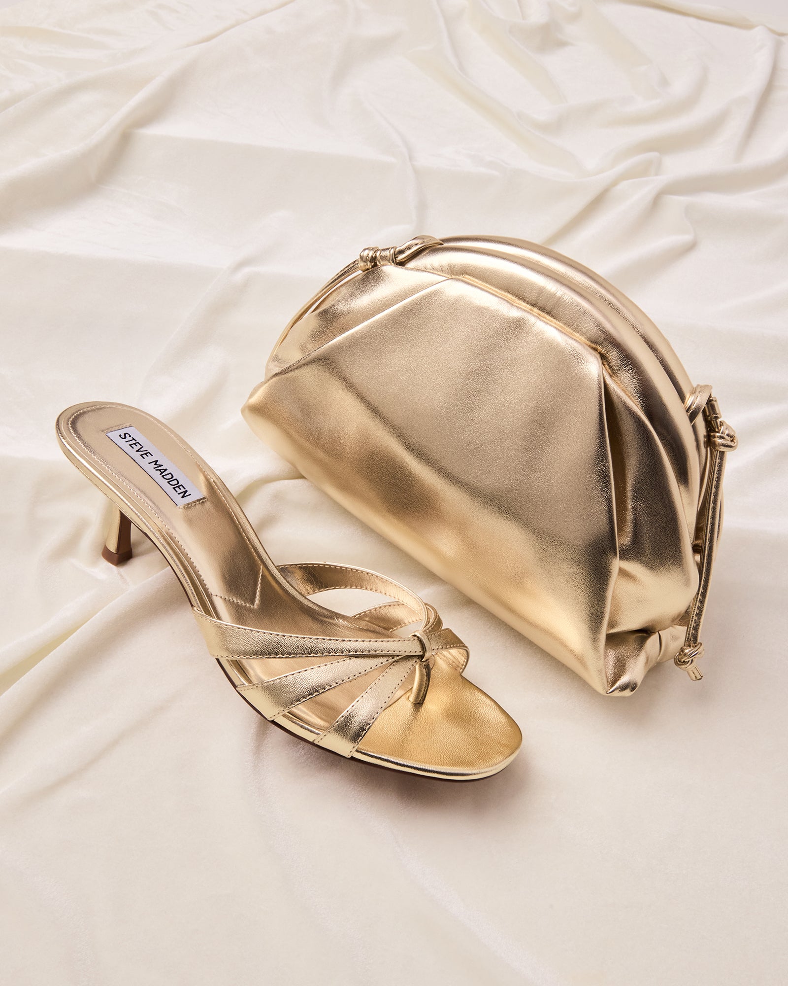 Cary Gold Leather Heels showcasing open-toe design from the front angle