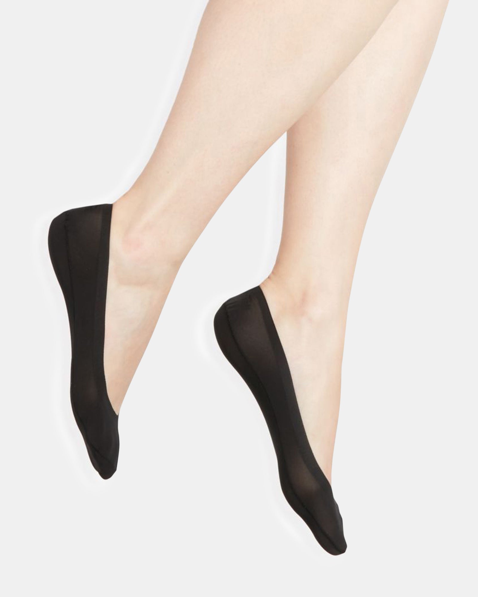Side view of socks no show socks worn with low-top sneakers outdoors