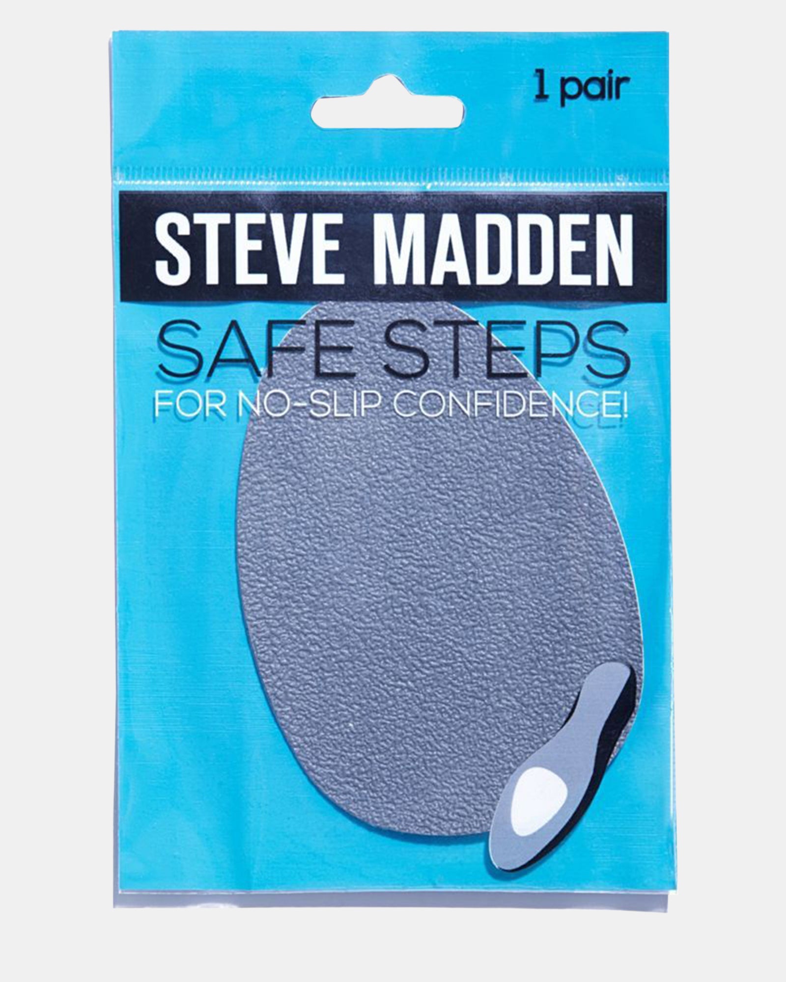 Top-down view of non-slip grips placed on sleek dance shoes