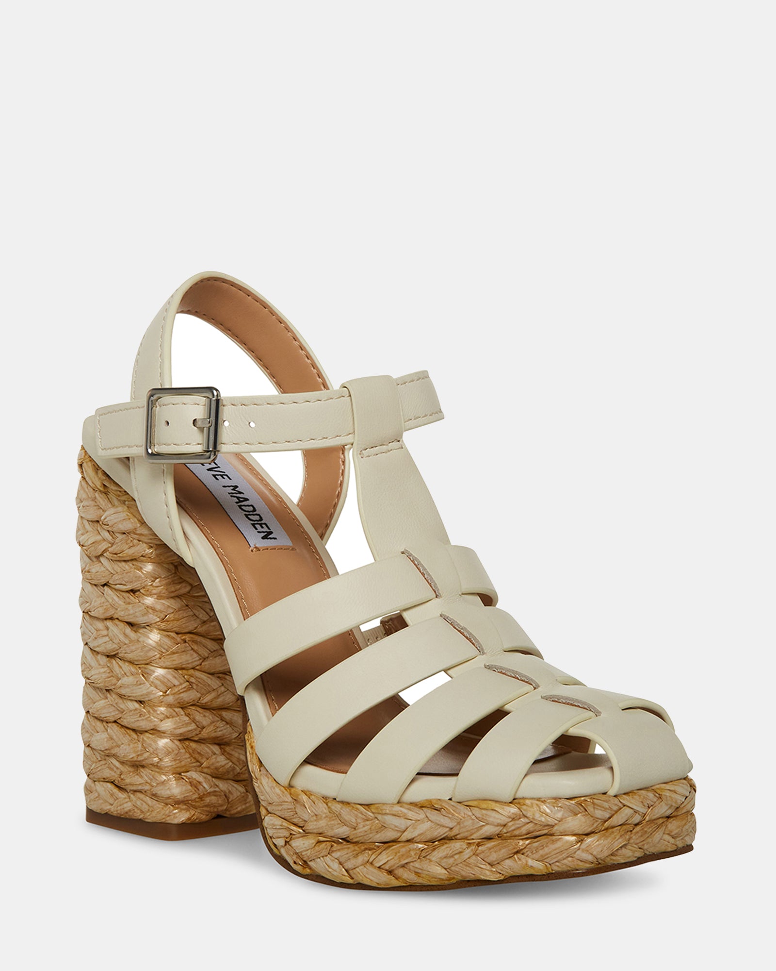 Close-up of block heel sandals highlighting buckle closure and textured raffia