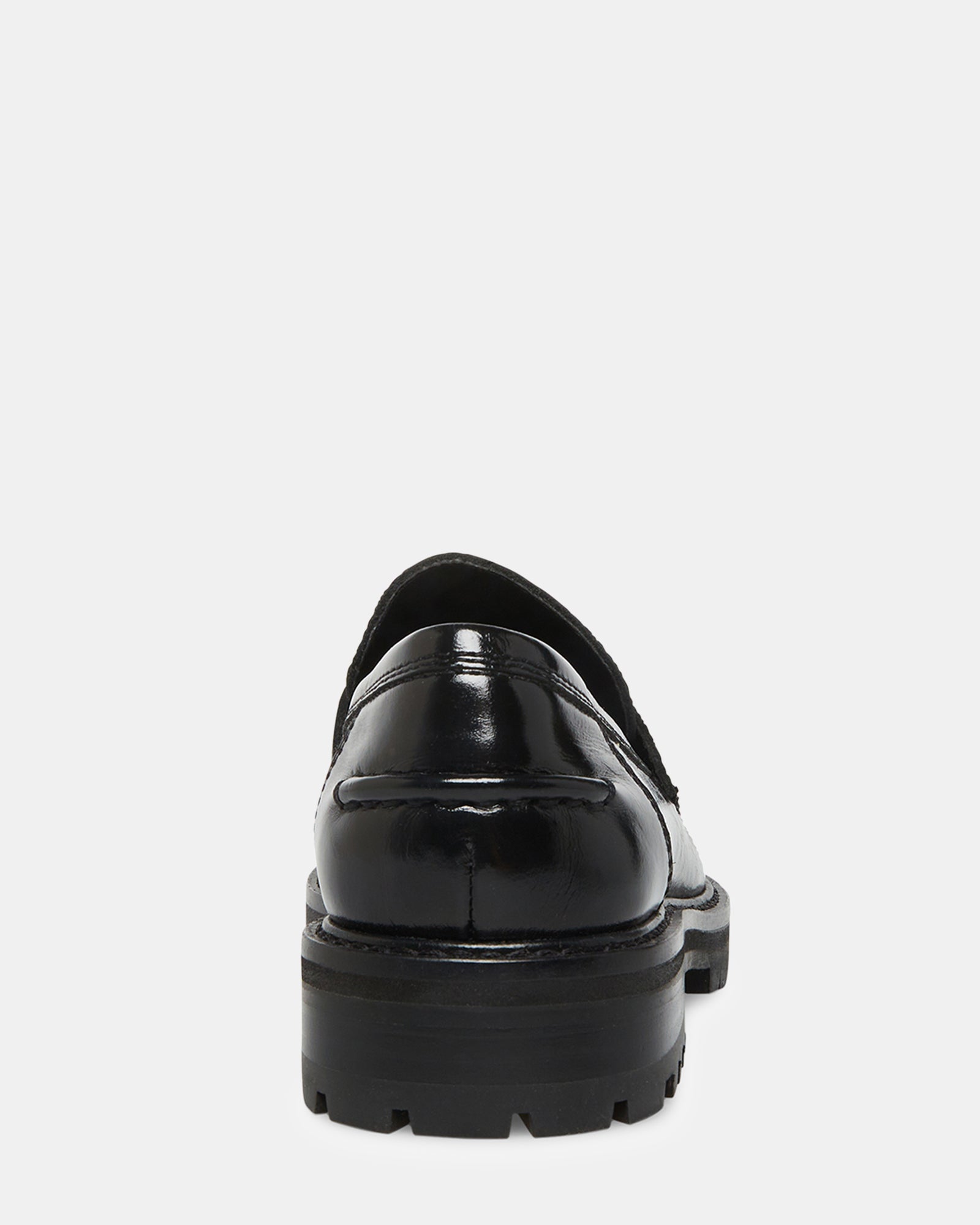 Close-up of MINKA loafers tassel detail and textured sole