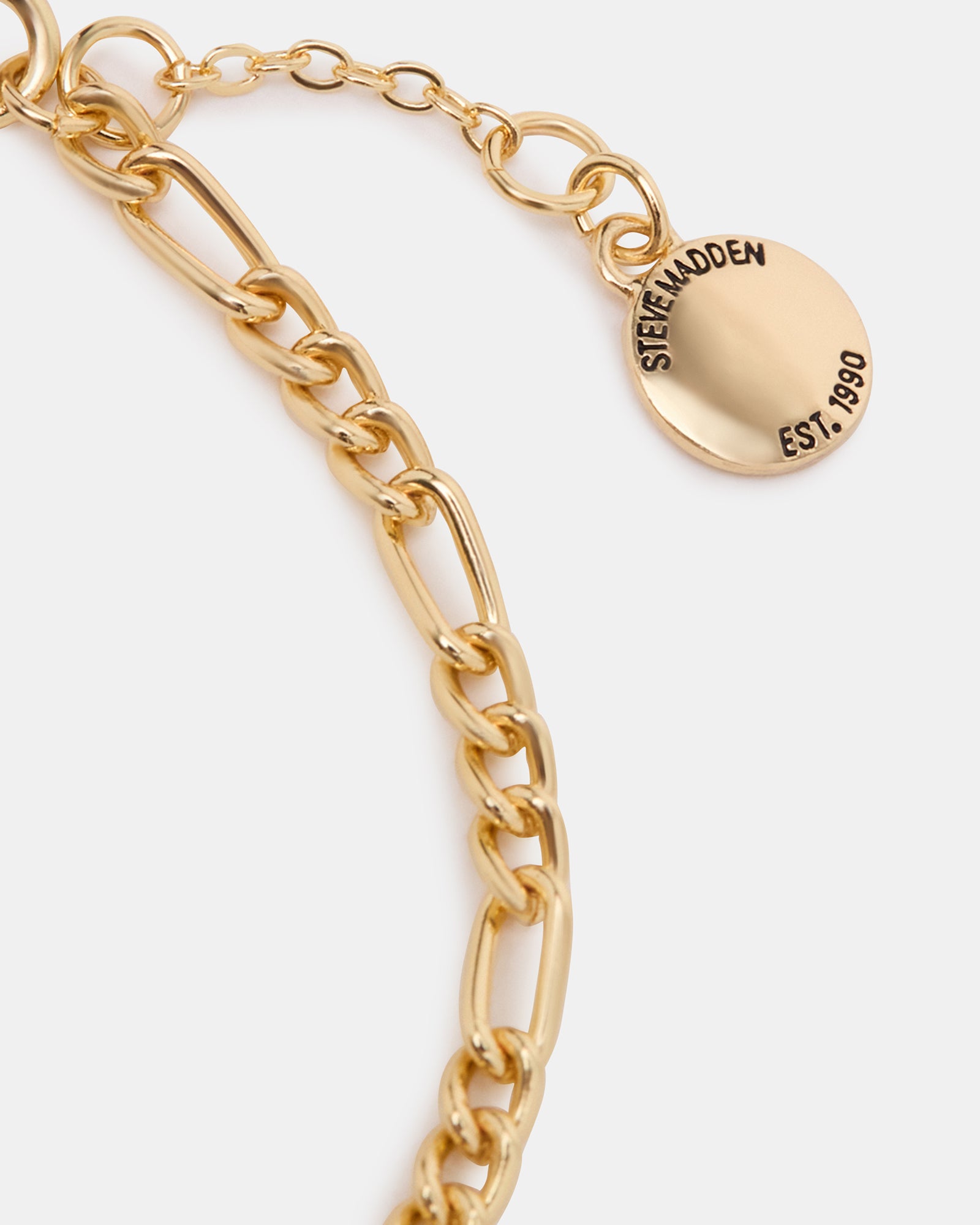 Elegant gold anklet with lobster clasp on a white background