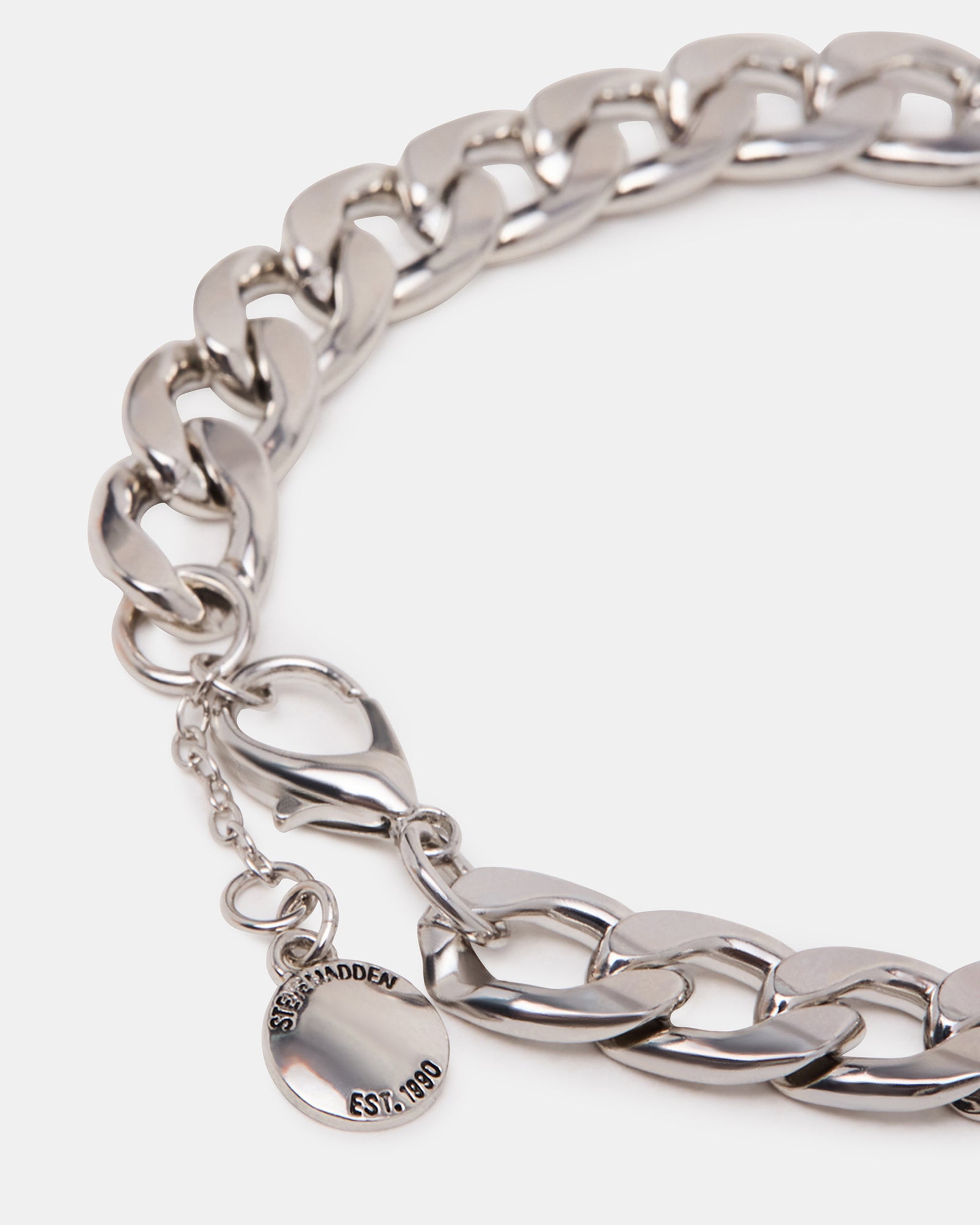 Sterling silver anklet displayed on black velvet with lobster clasp visible