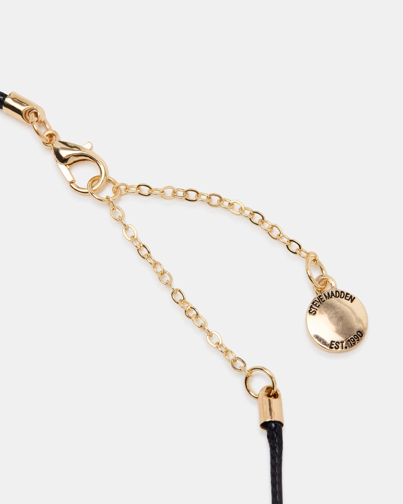 Flat lay of the choker necklace, highlighting its elegant details.