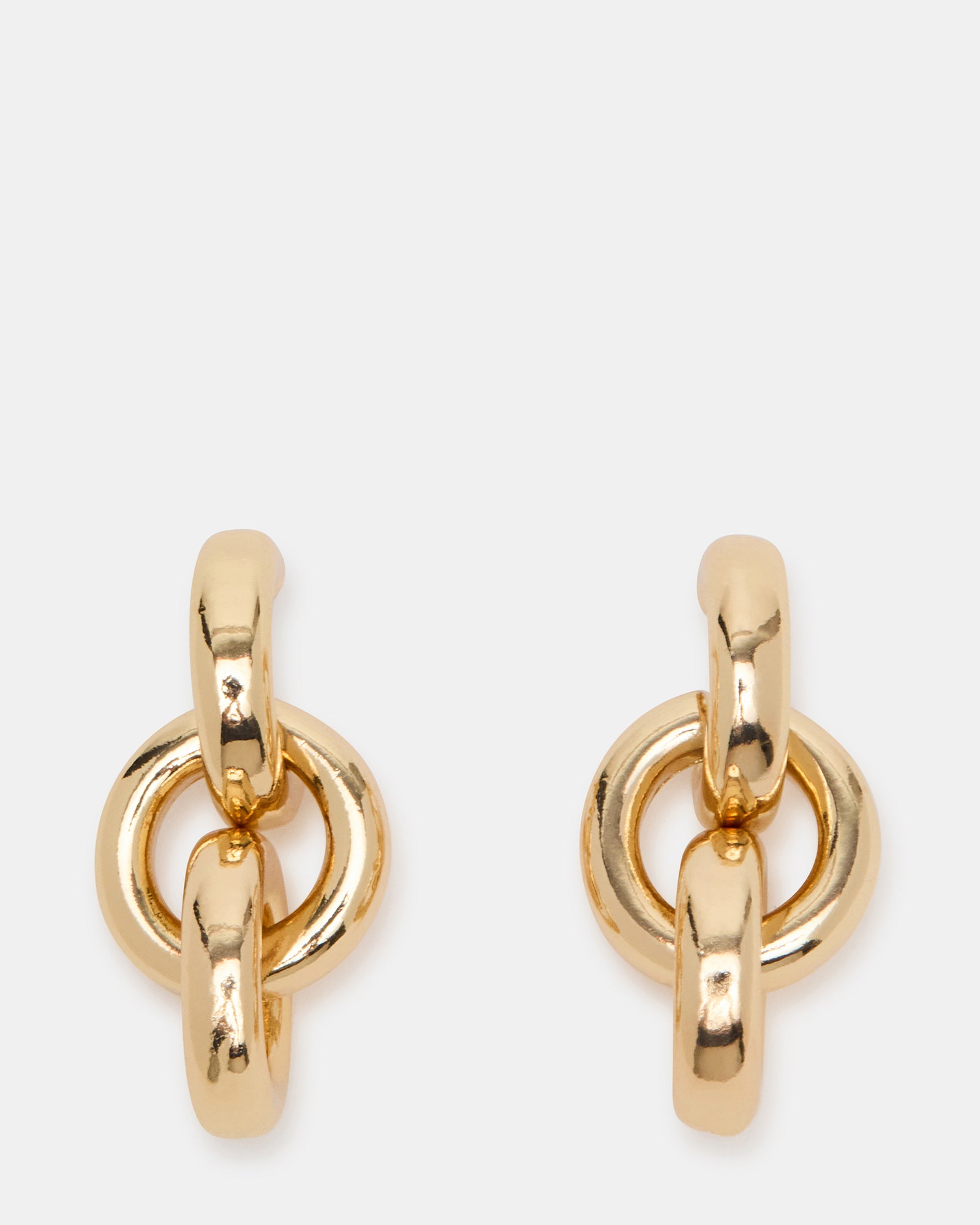 Close-up of gold tear drop earrings showcasing the intricate double lock detail.