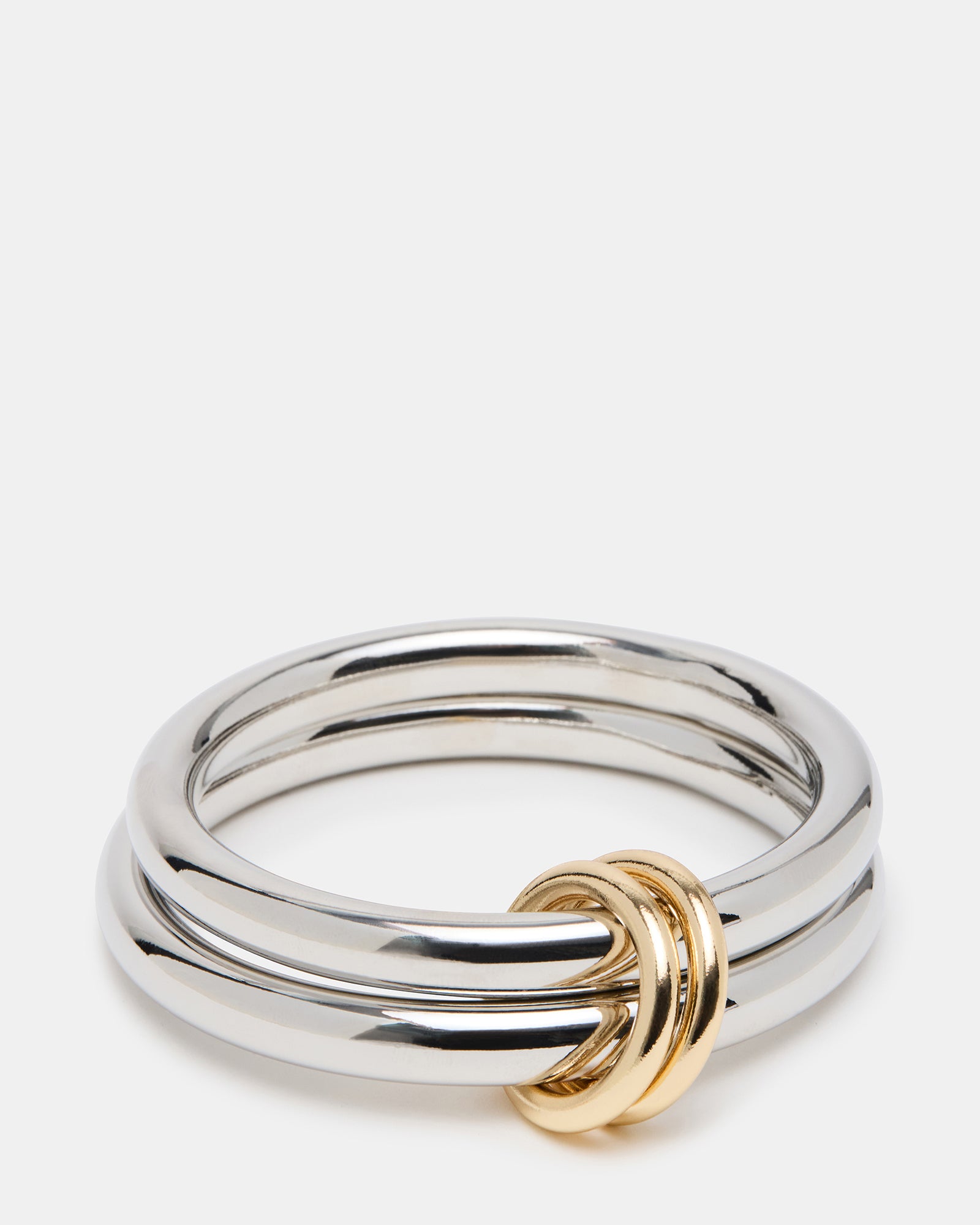 Close-up of the two-tone bangle bracelet highlighting its silver finish and design.