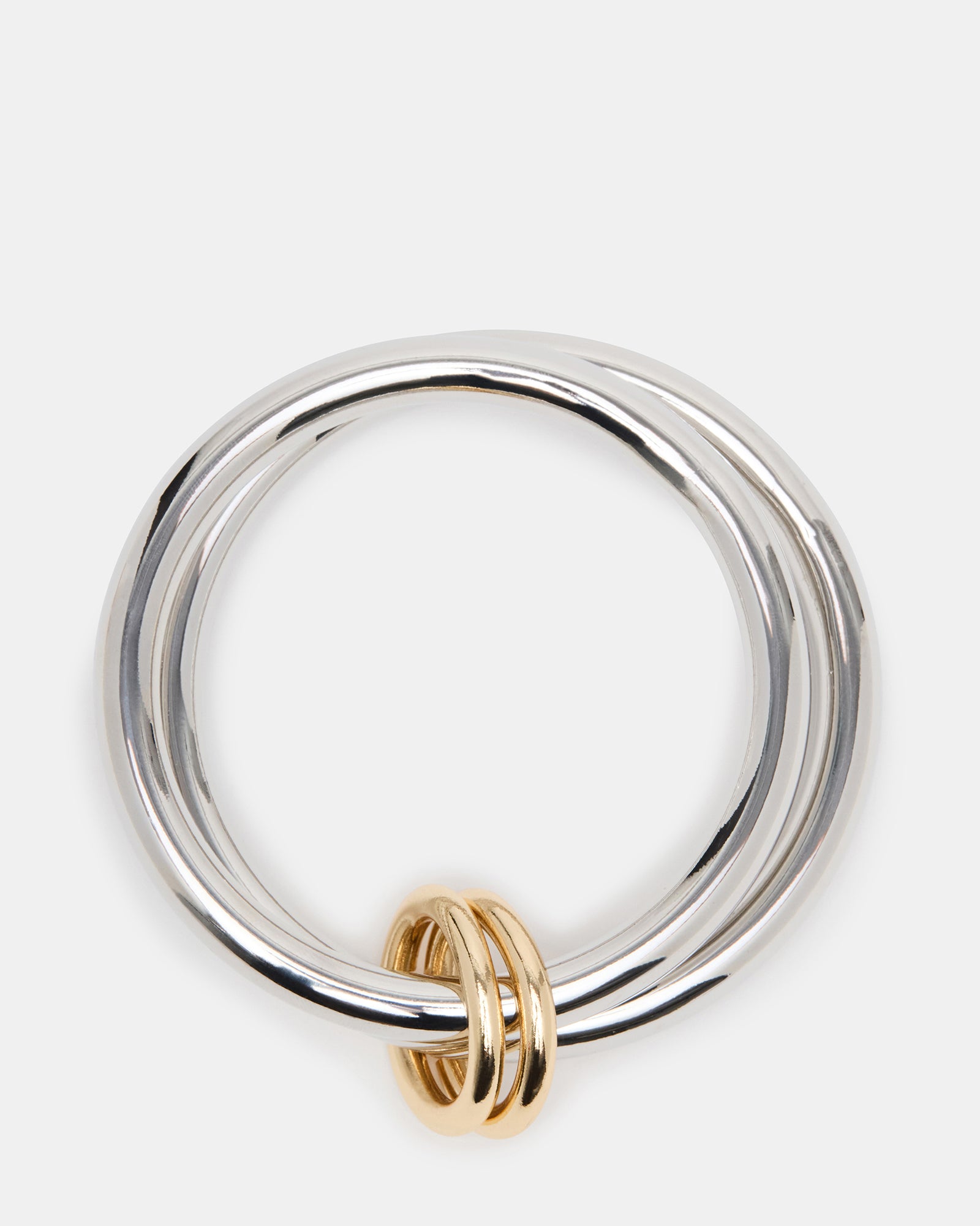 Elegant two-tone bangle bracelet set with silver and multi-tone accents.