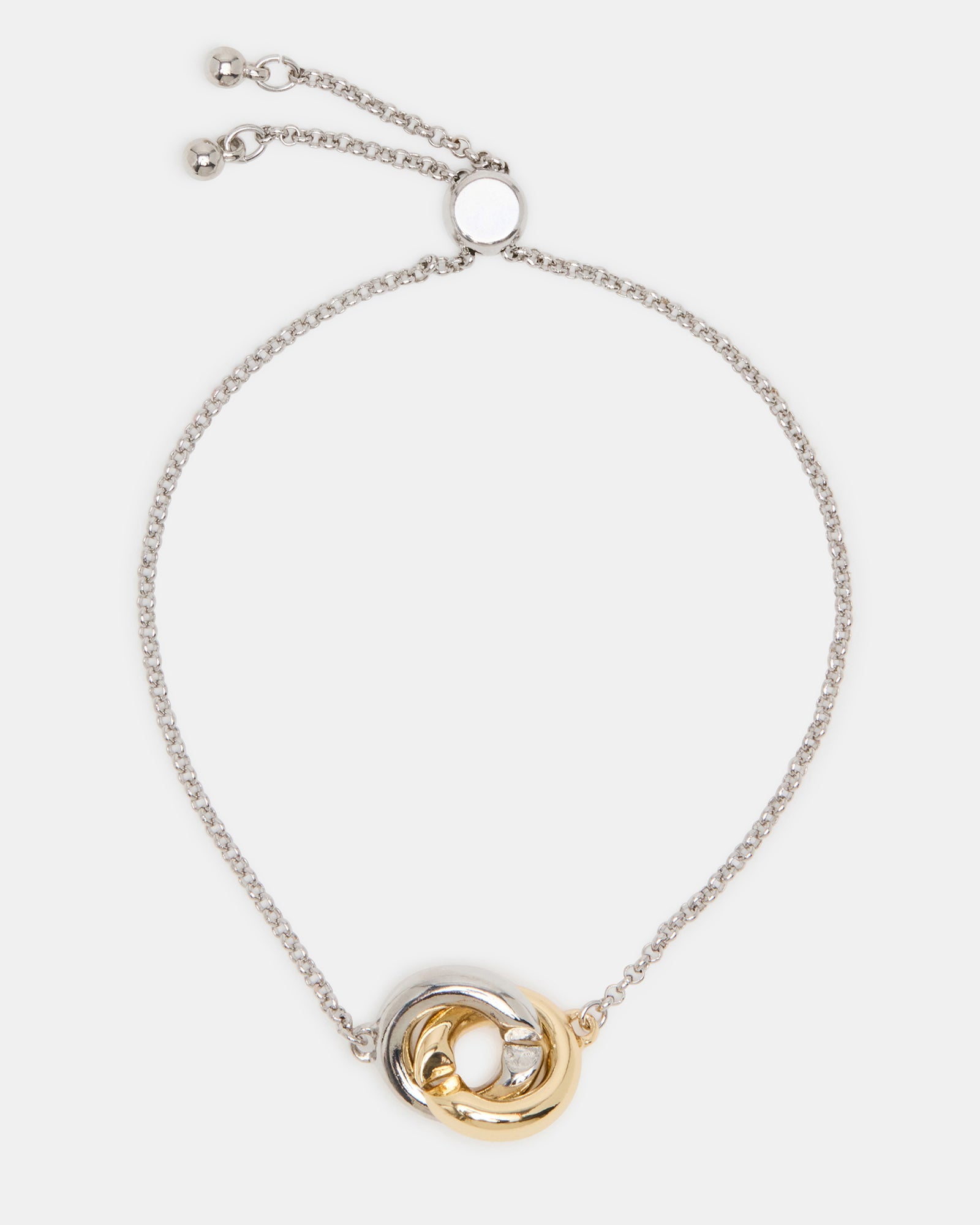 Close-up of the elegant two-tone silver friendship bracelet highlighting its bolo design.