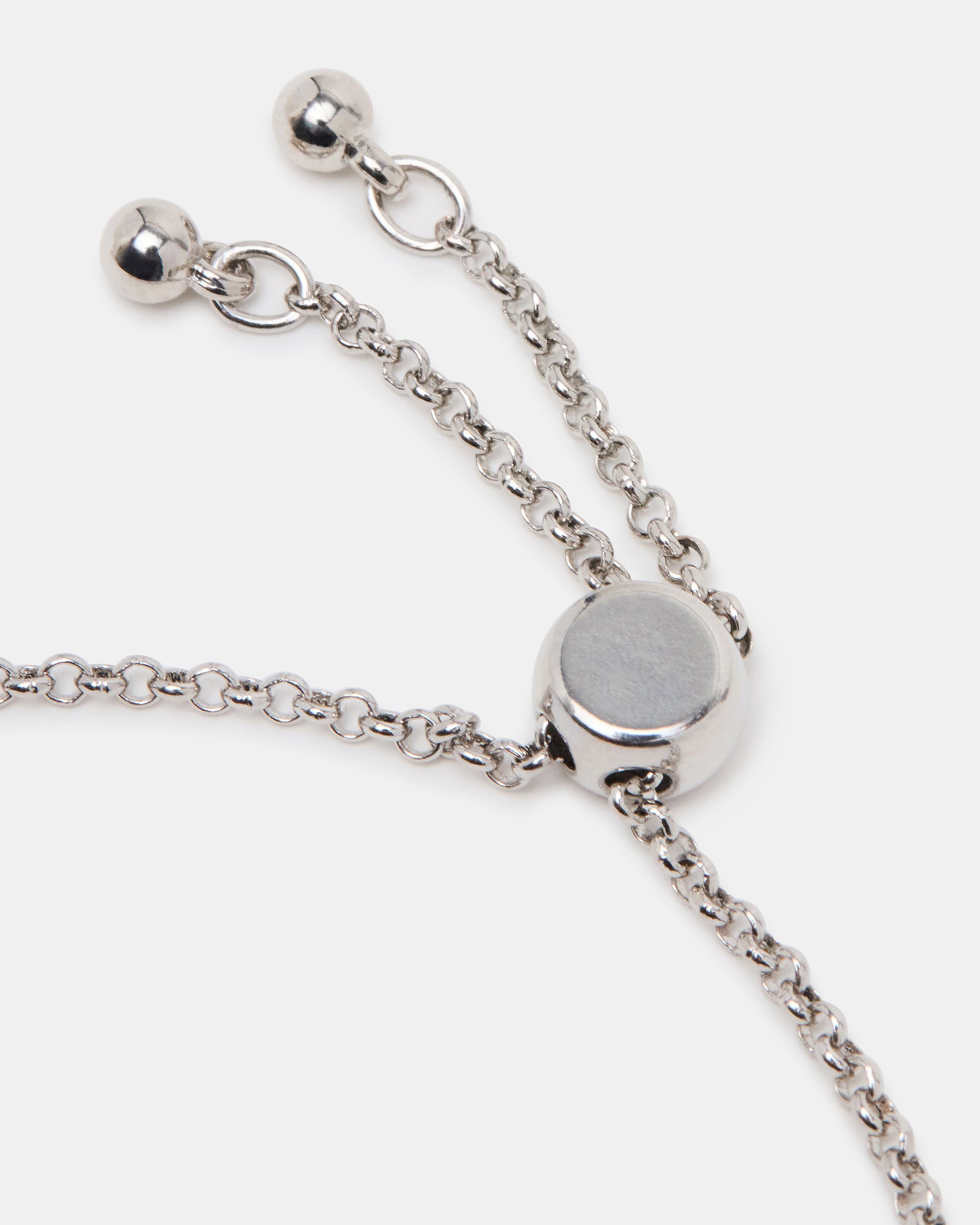 Detailed view of the silver friendship bracelet showcasing the quality materials and finish.