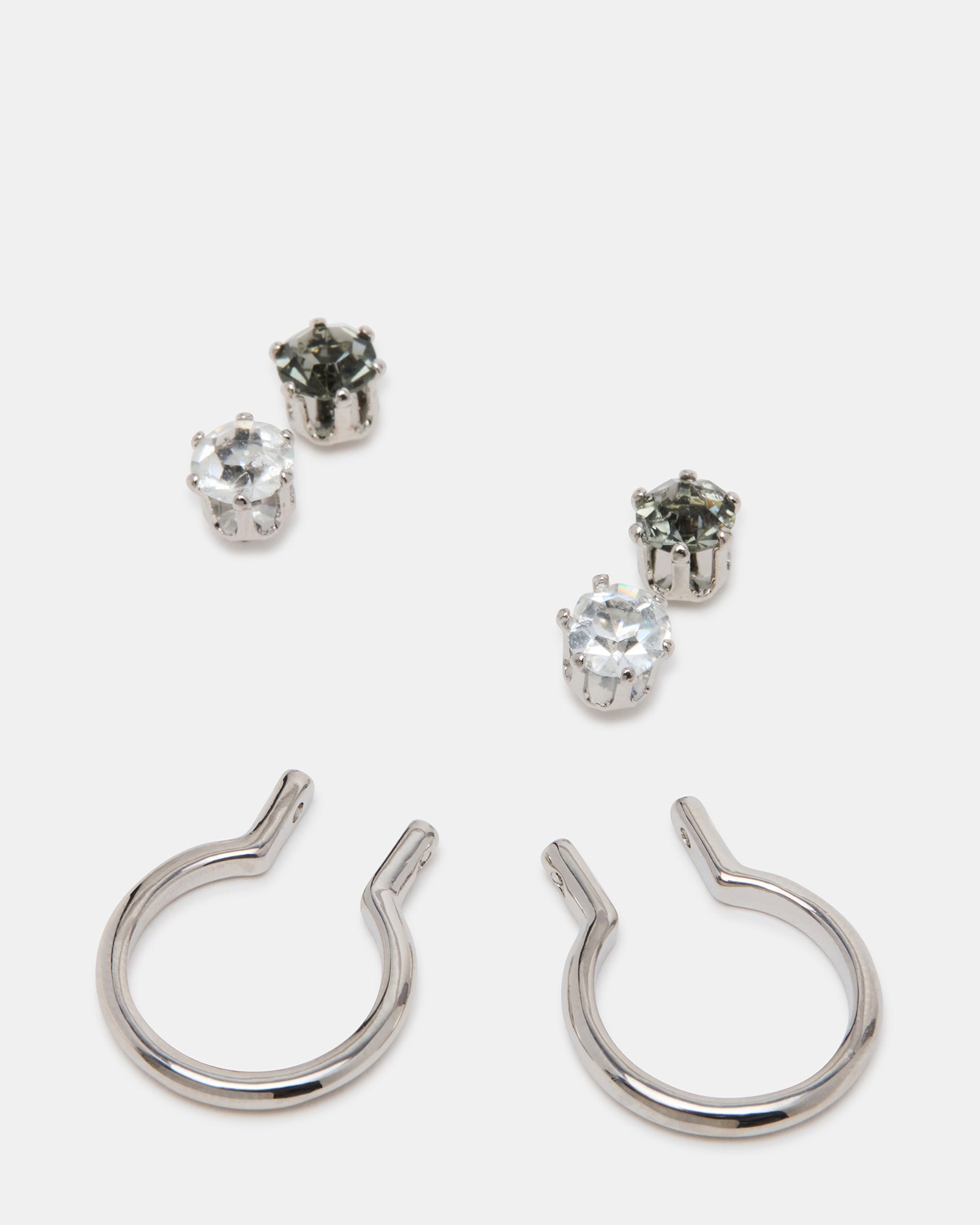 Elegant crystal drop earrings with black and silver accents on a model