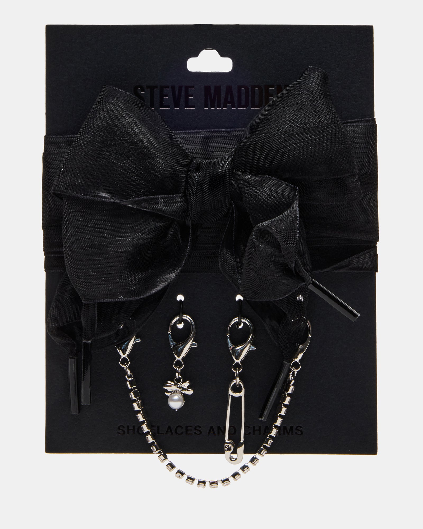 Elegant black shoe laces with charms on a stylish shoe.