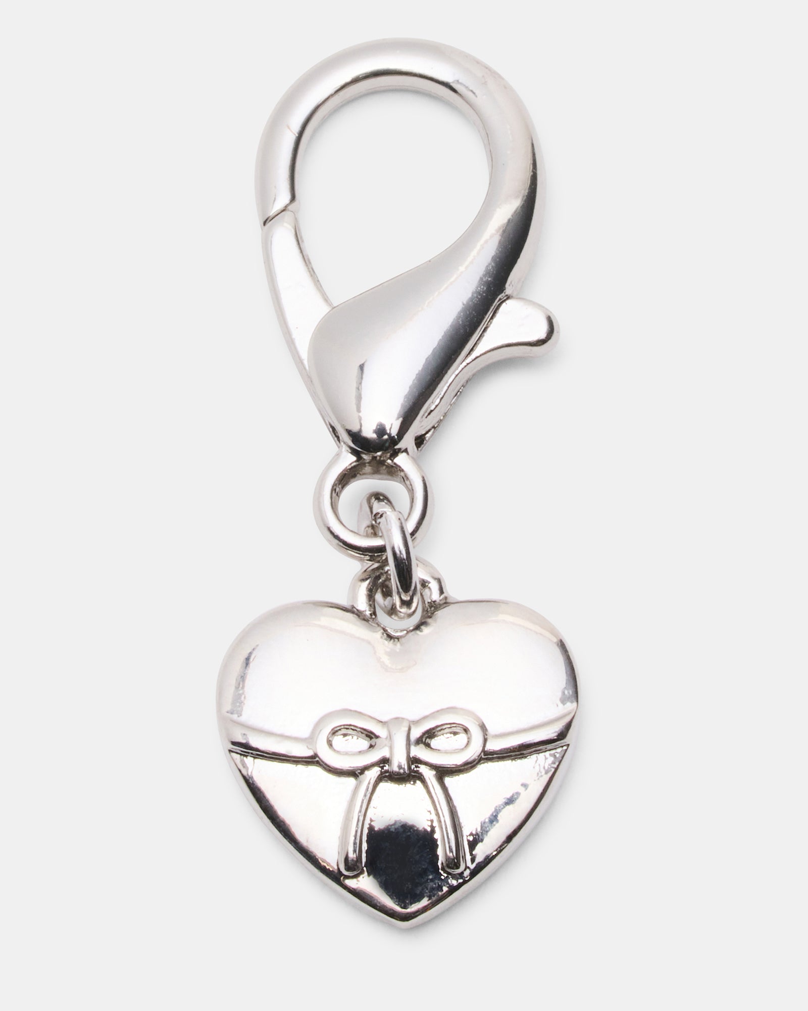 Elegant shoe laces with a black lace bow and heart charm.