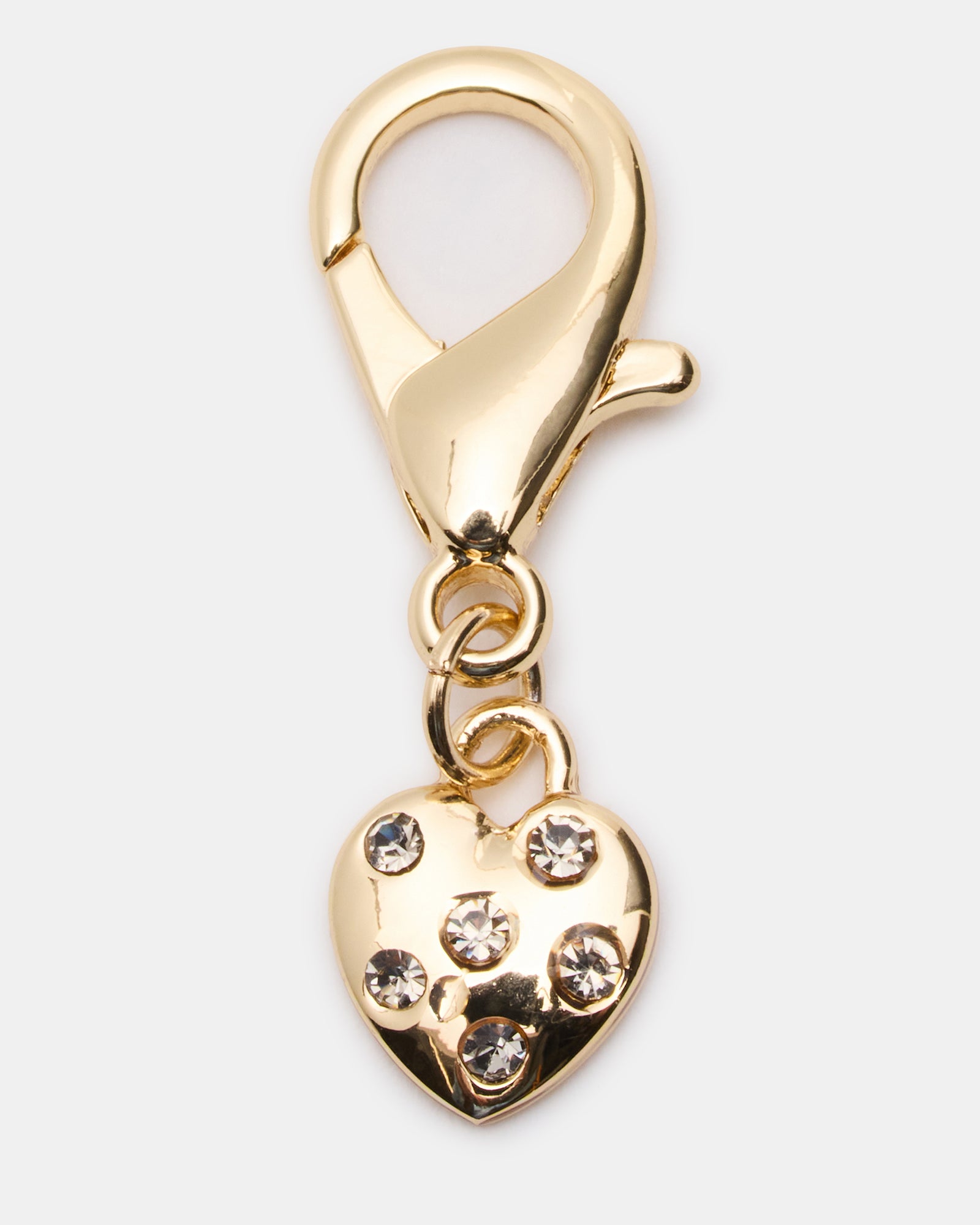 Fashionable shoe charms on white laces giving a unique touch.