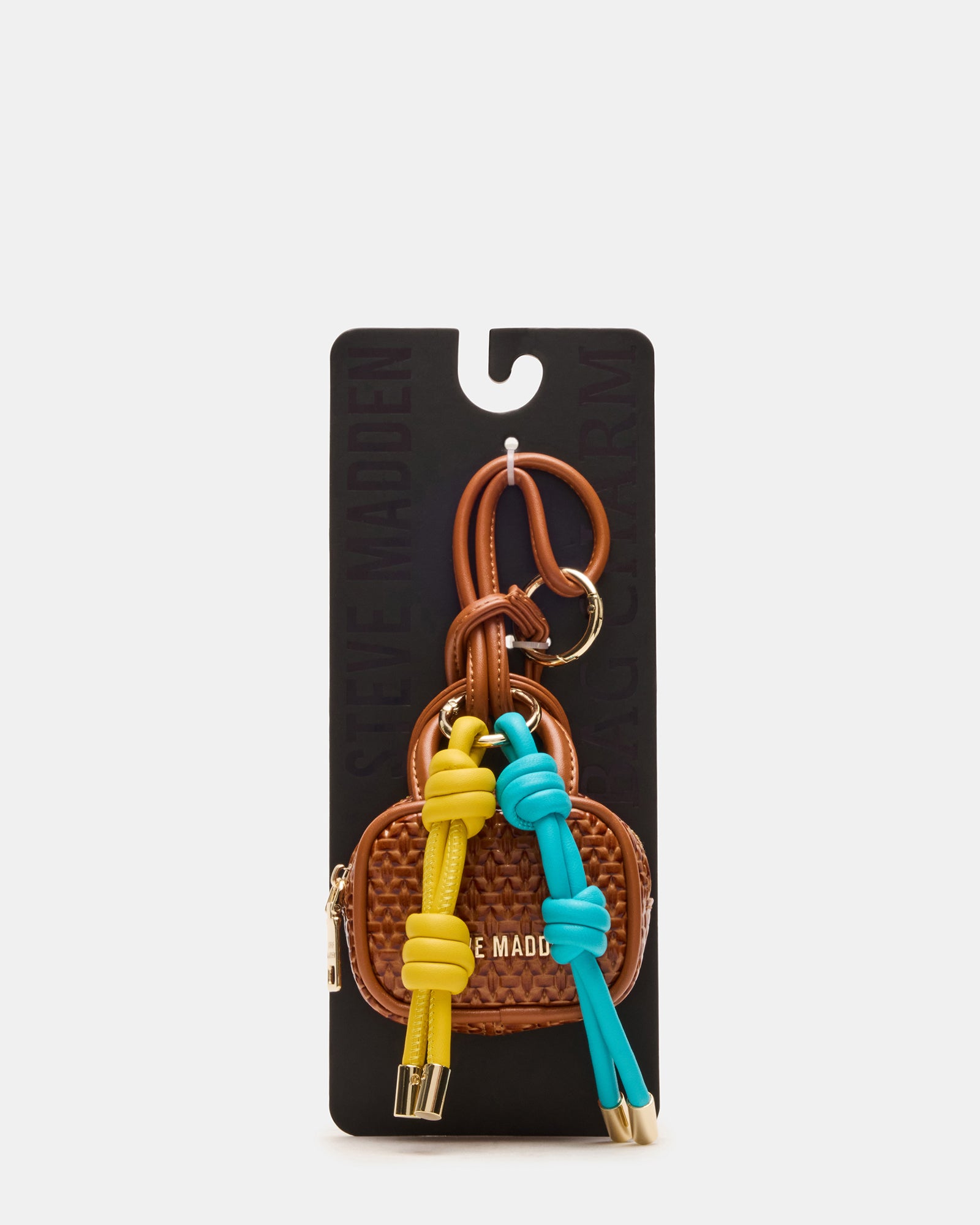 Side view of stylish bag charm showing zipper and O-ring hinge