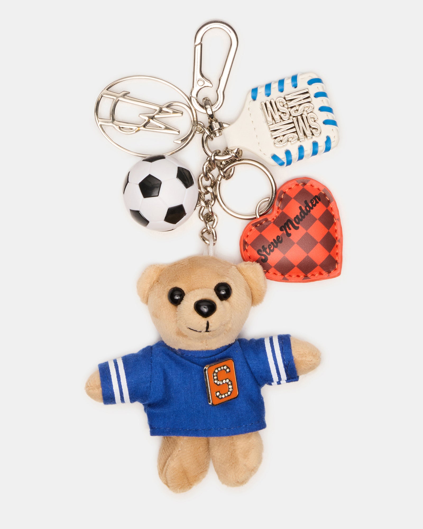 Front view of soccer bag charm on navy tote with puffed heart detail