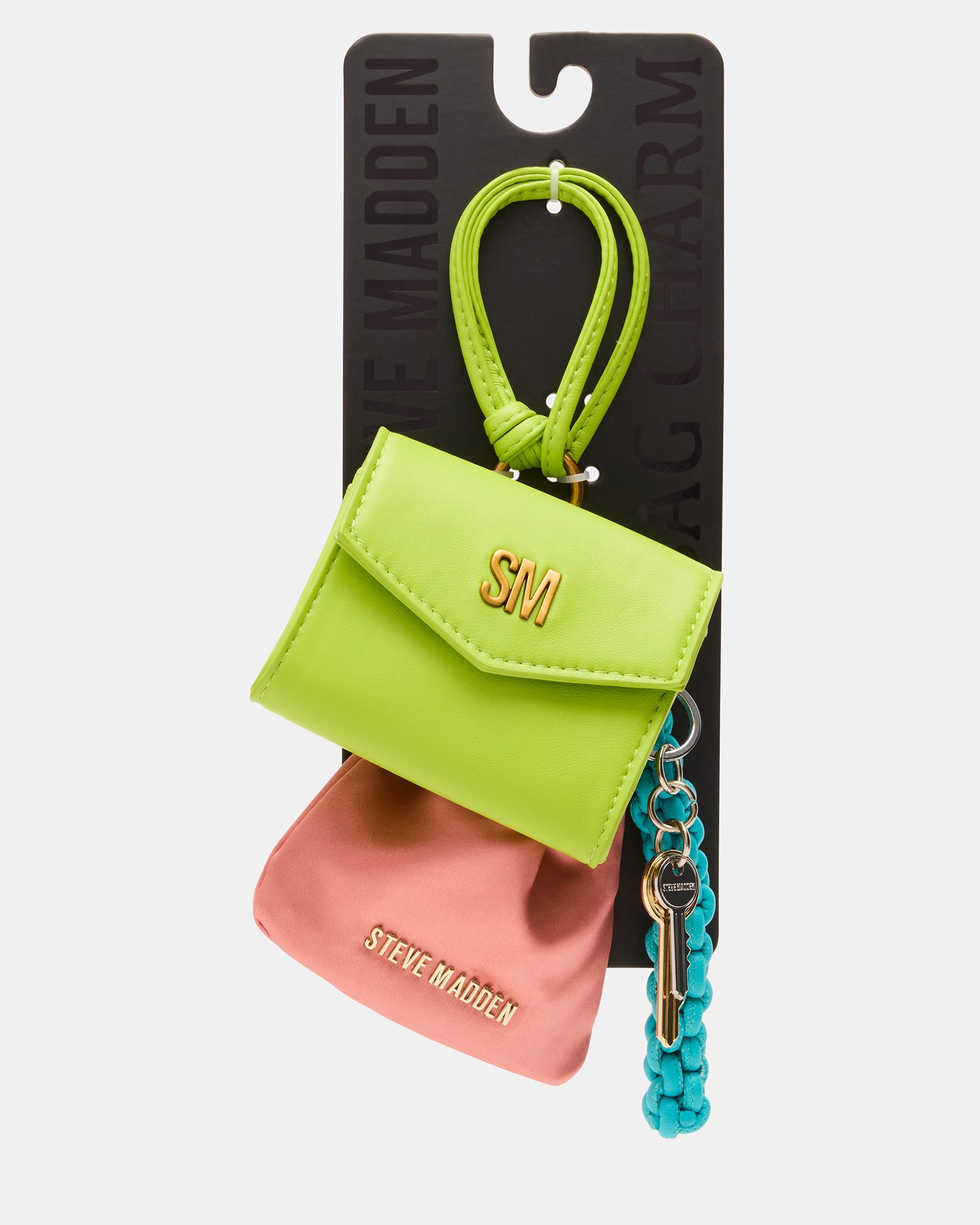 Travel bag charm set displayed with lanyard and duster bag