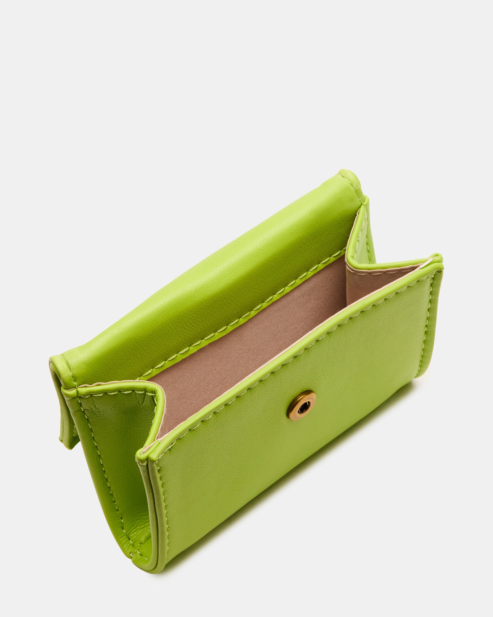 Compact pouch and bag charm held in hand for size reference