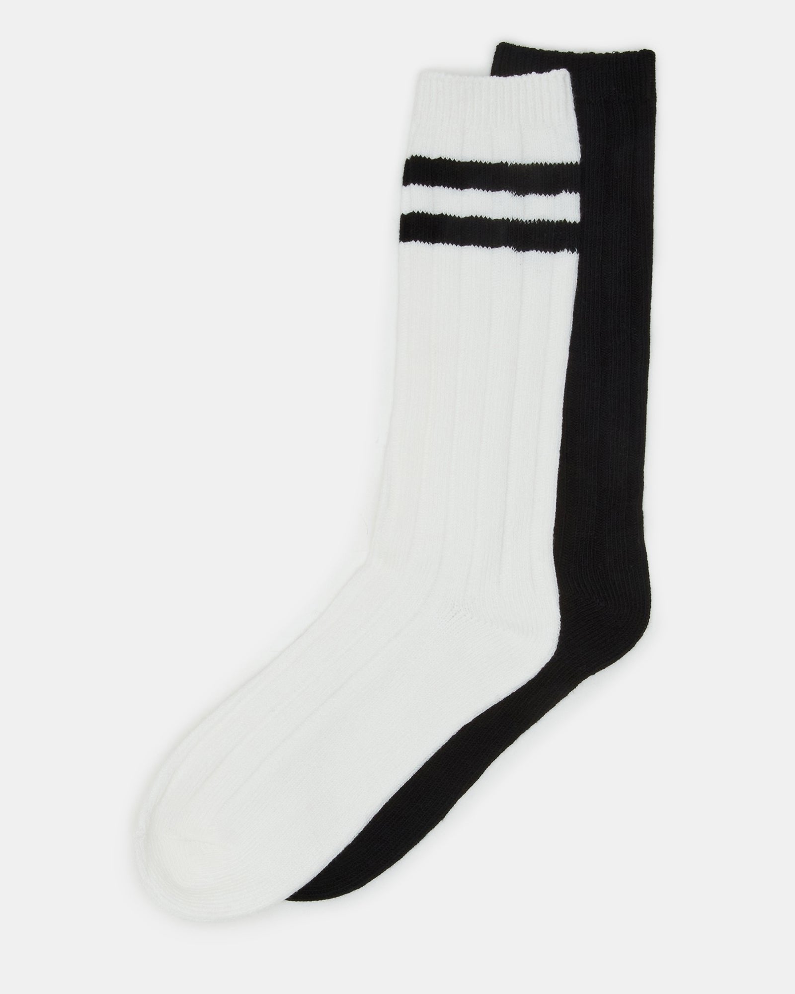 Close-up of striped boot socks showcasing black and white design.
