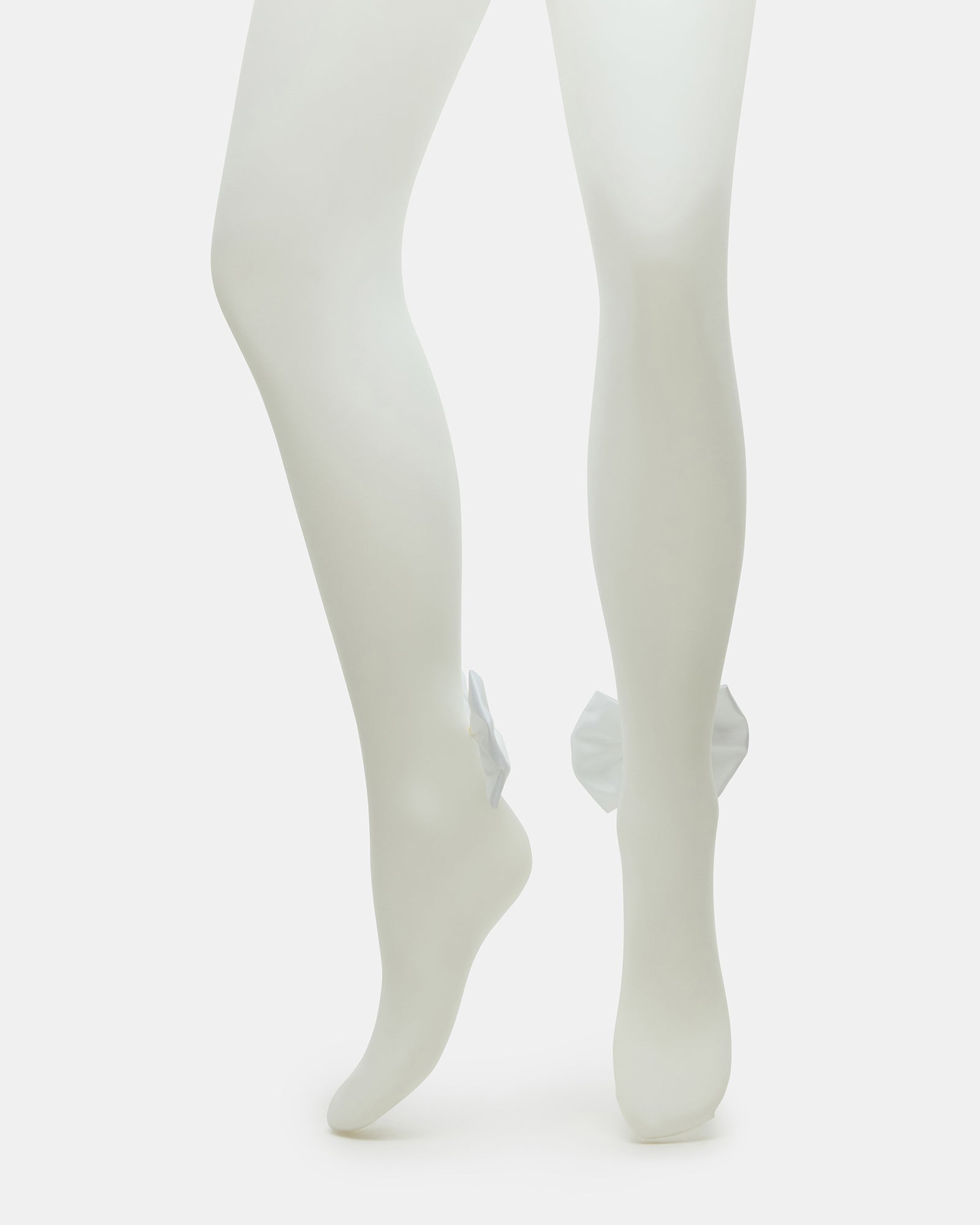 Close-up of back seam and bow on wedding hosiery