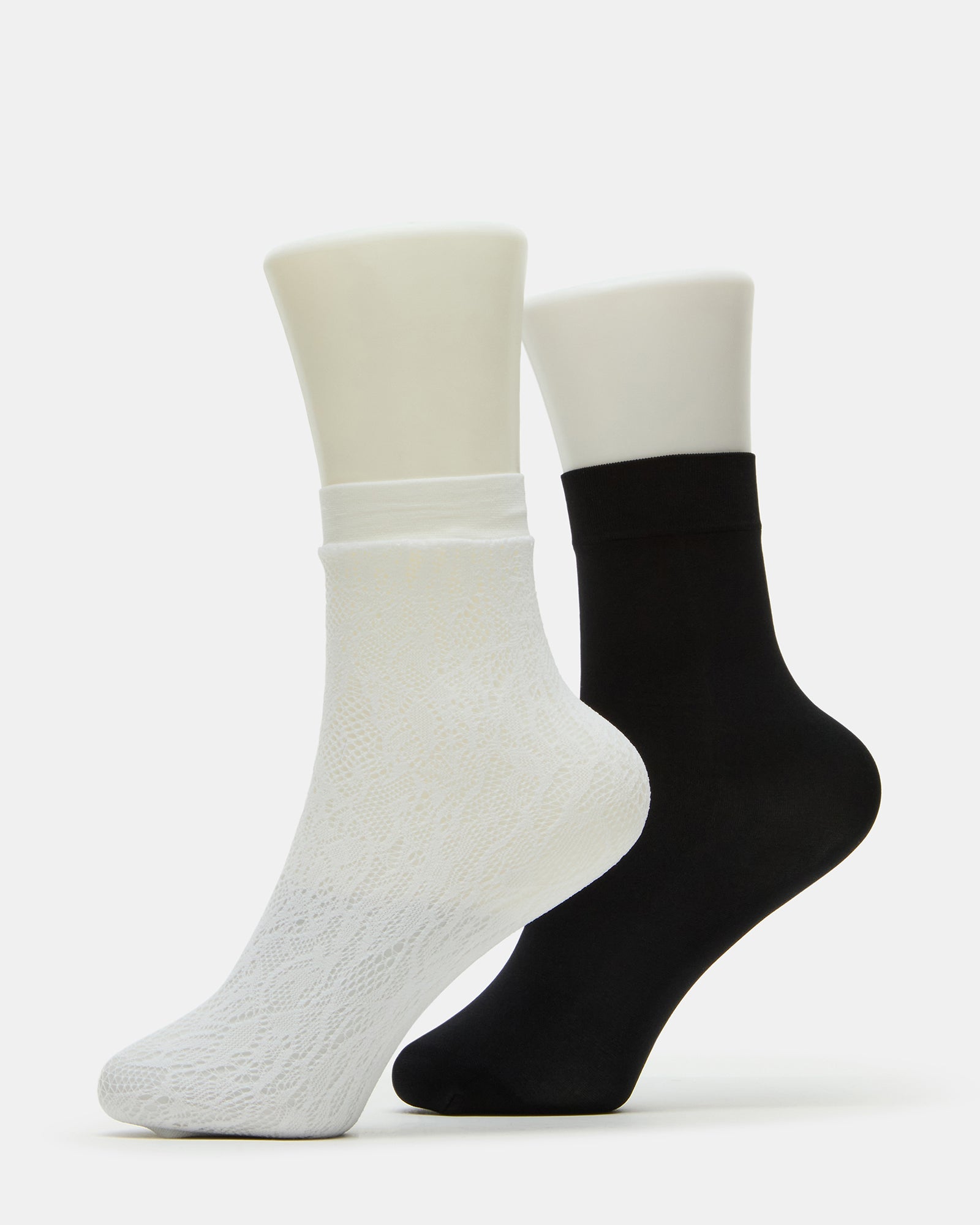 White lace anklet socks folded neatly, showcasing lace detailing