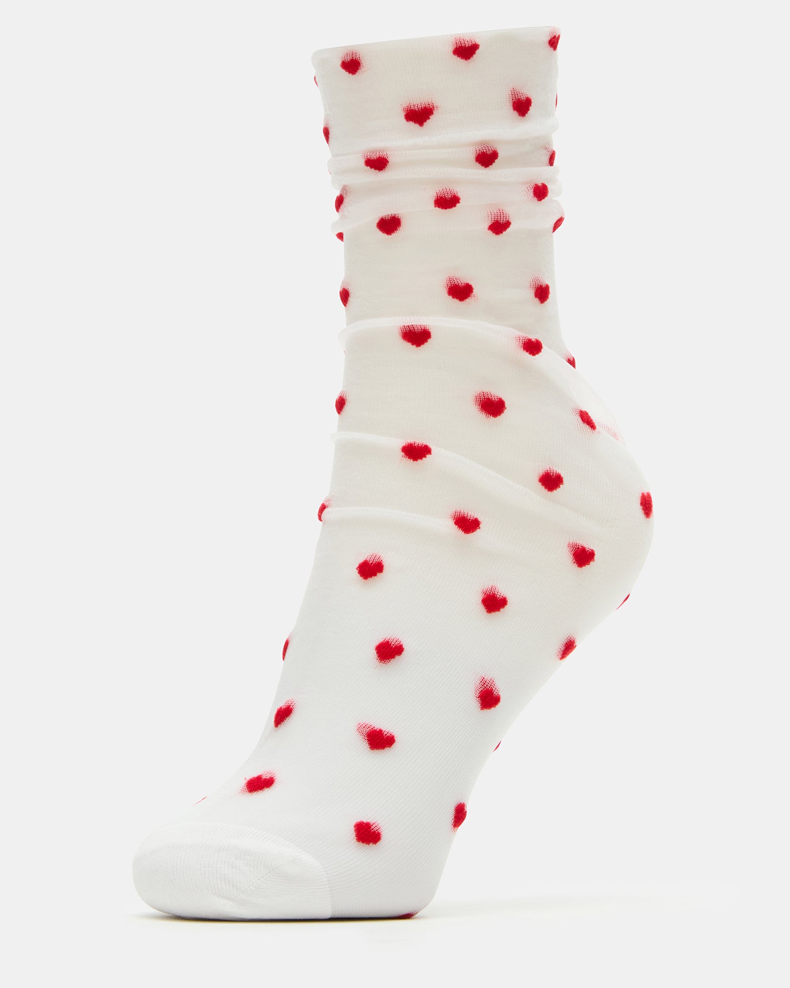 Close-up of sheer socks with playful heart pattern for women or men