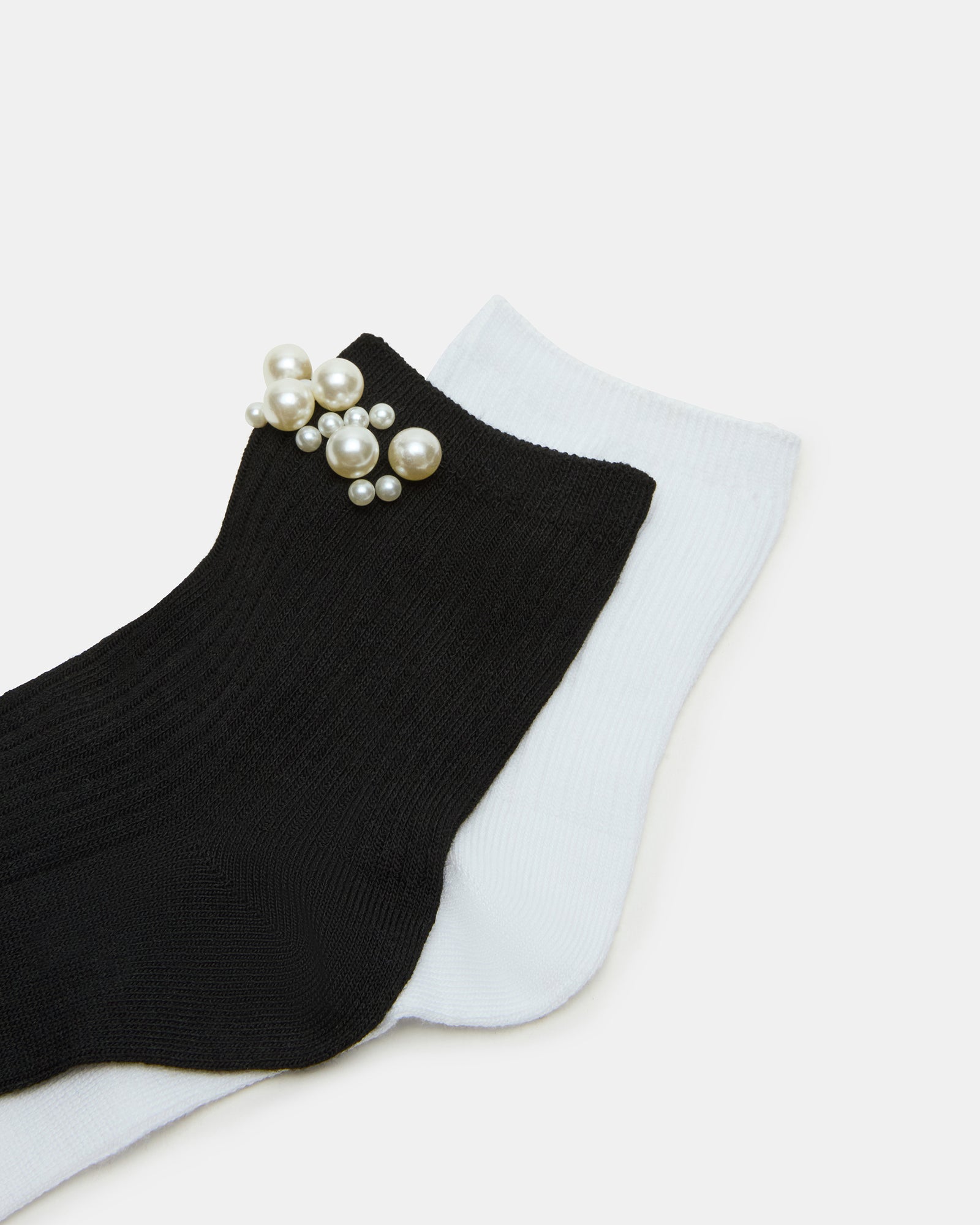 Magnolia pearl socks styled with loafers for casual elegance