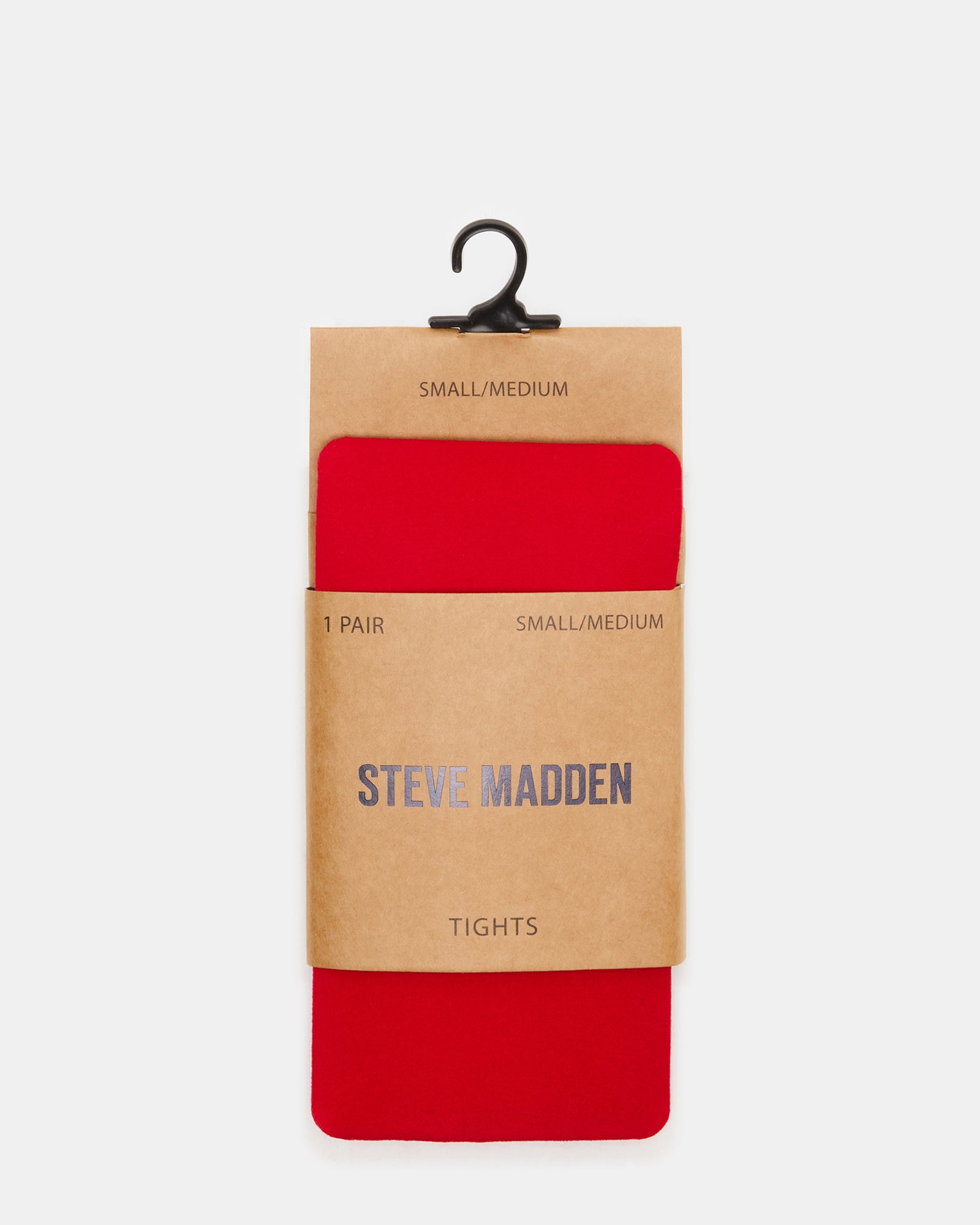 Radiant red tights styled with autumn layers for a streetwear look