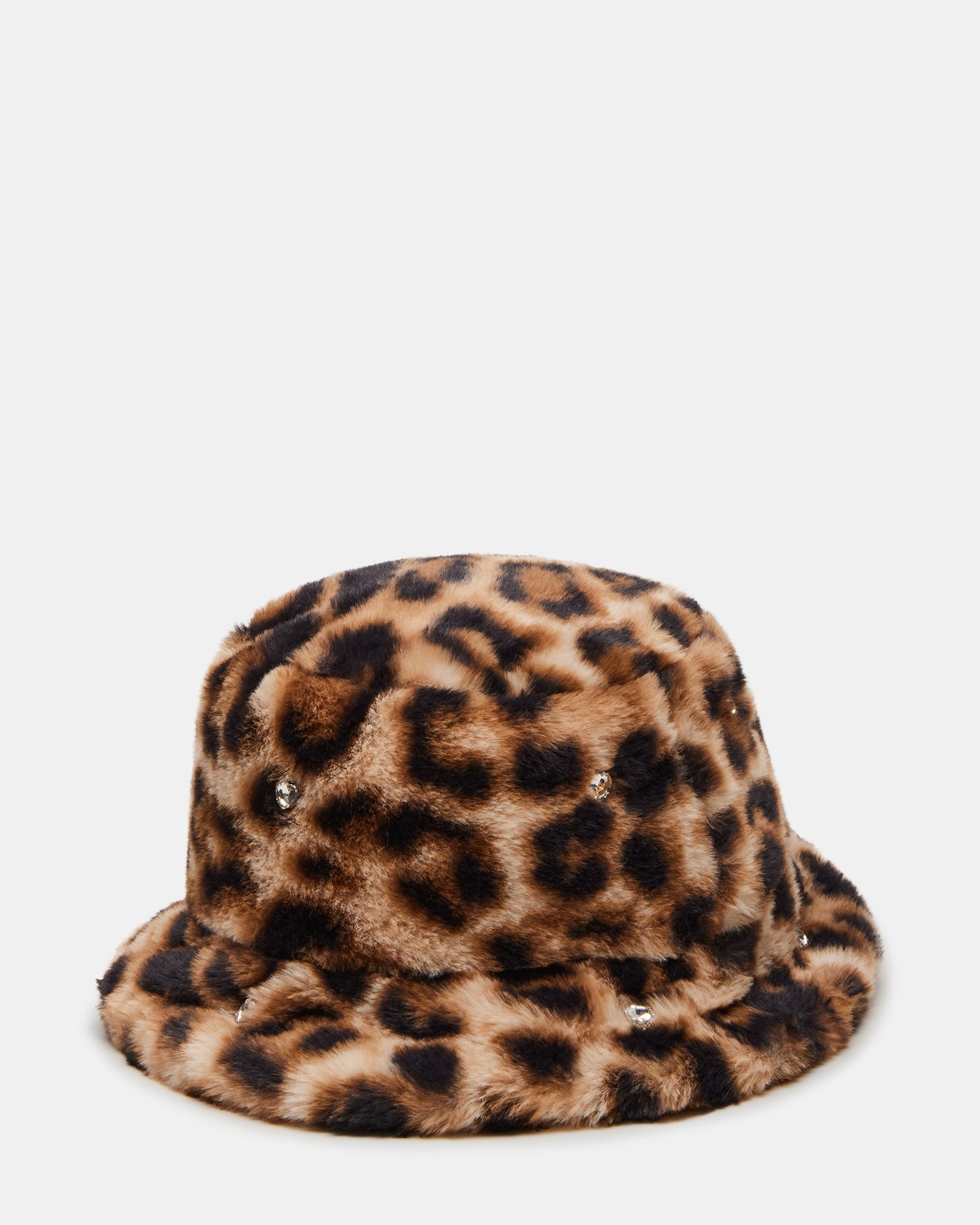 Fashionable woman wearing a leopard faux fur bucket hat outdoors