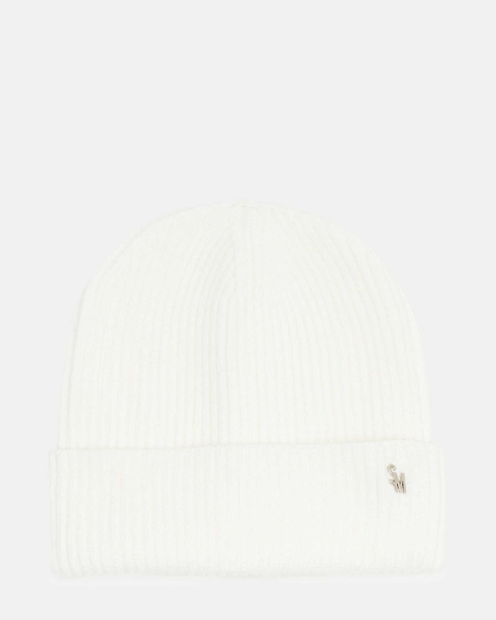 Front view of ivory ribbed knit winter beanie for infants.