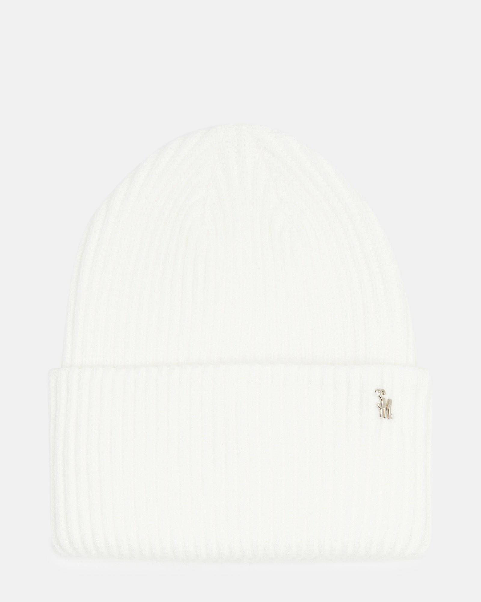 Woman wearing ivory double layer beanie in snowy park